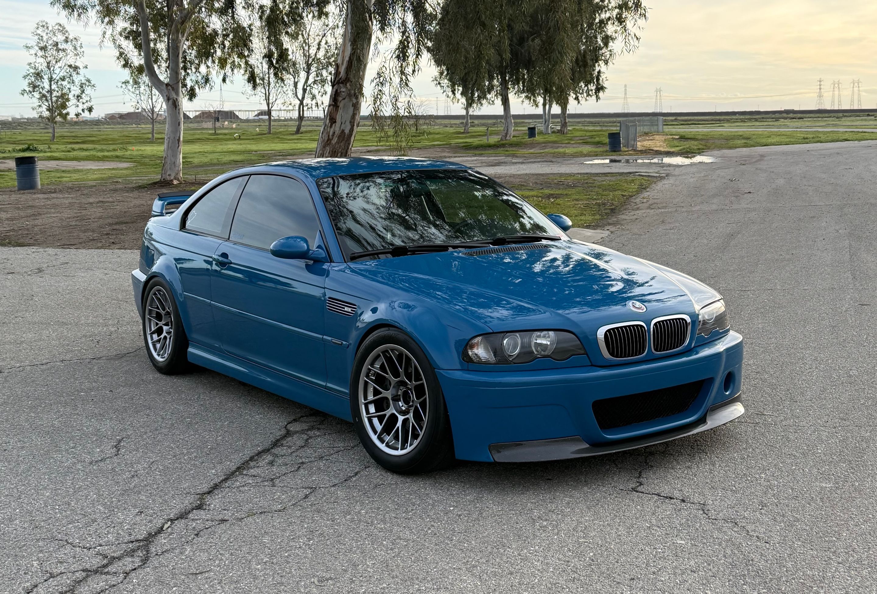 Blue BMW E46 M3 with 17" ARC-8 Apex wheels in Hyper Black