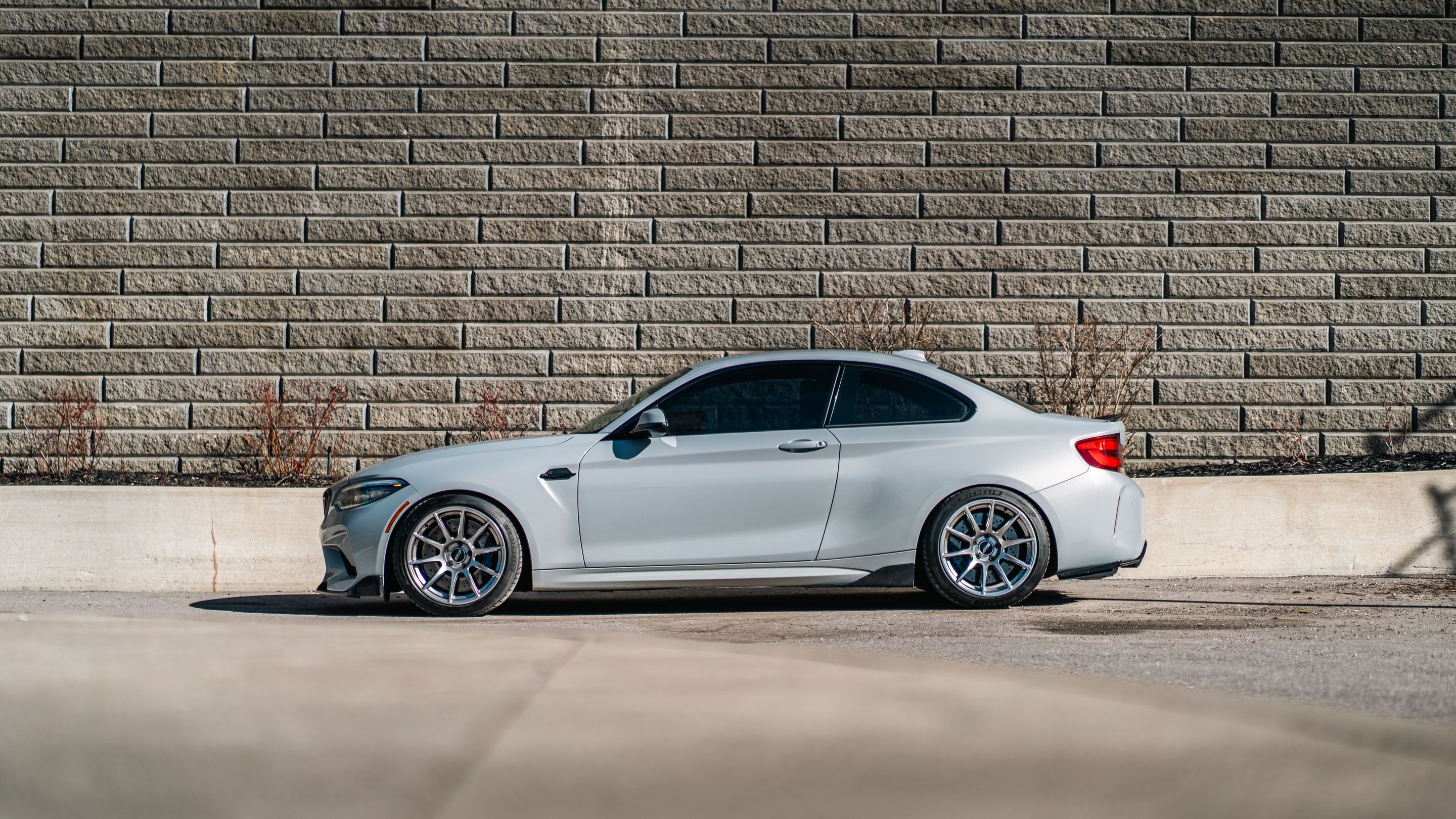 Silver BMW F87 M2 with 18" SM-10 Apex wheels in Anthracite