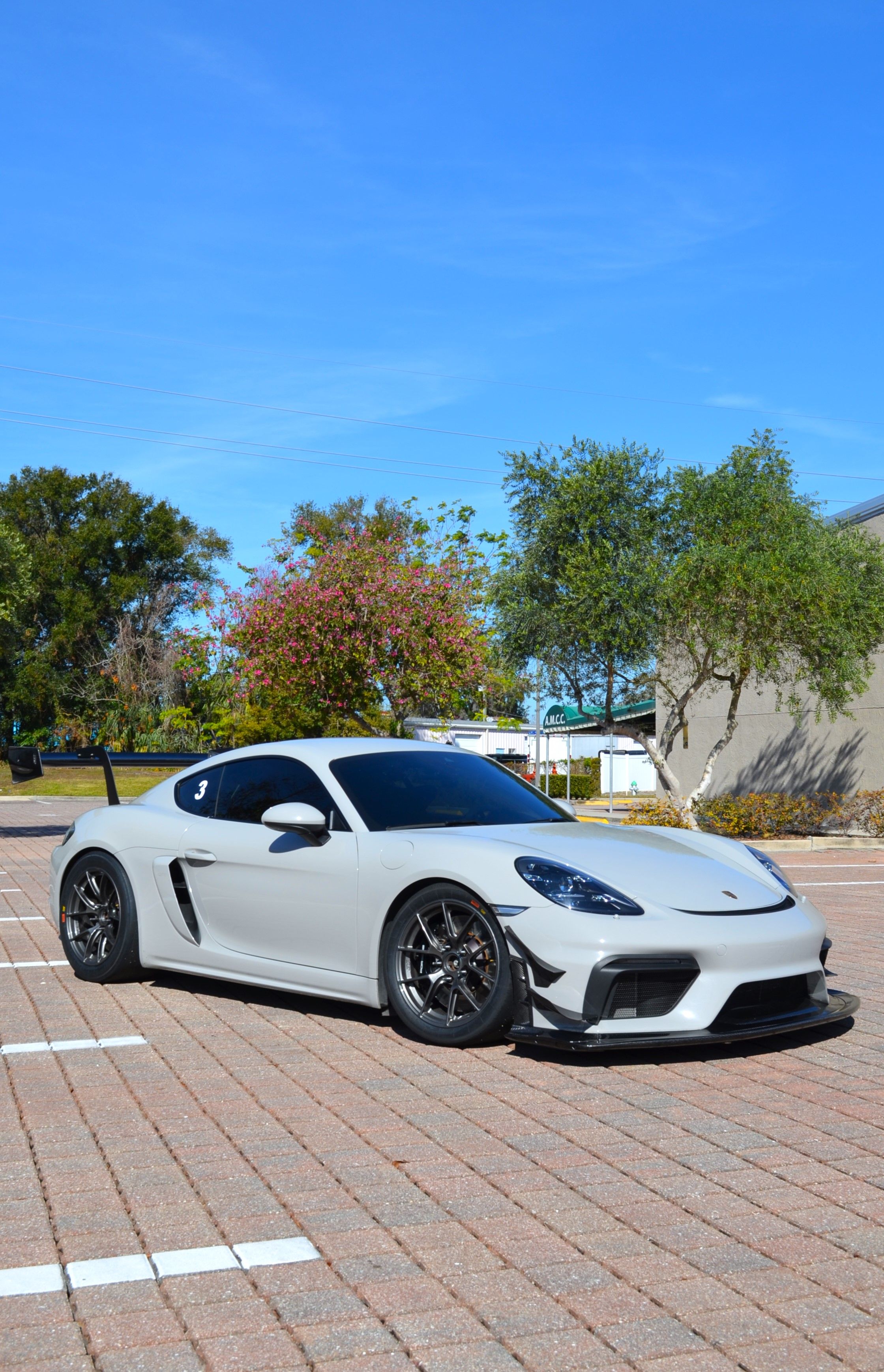 Grey Porsche 718 Cayman GT4 with 18" VS-5RS Apex wheels in Anthracite