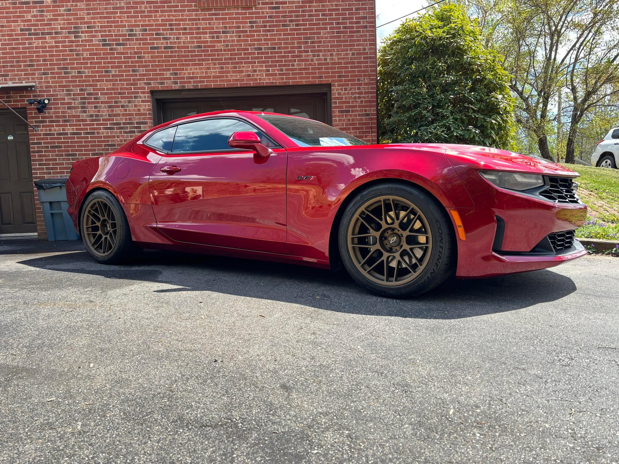 Red Chevrolet 6th Gen Camaro LT1 with 19" ARC-8 Apex wheels in Satin Bronze