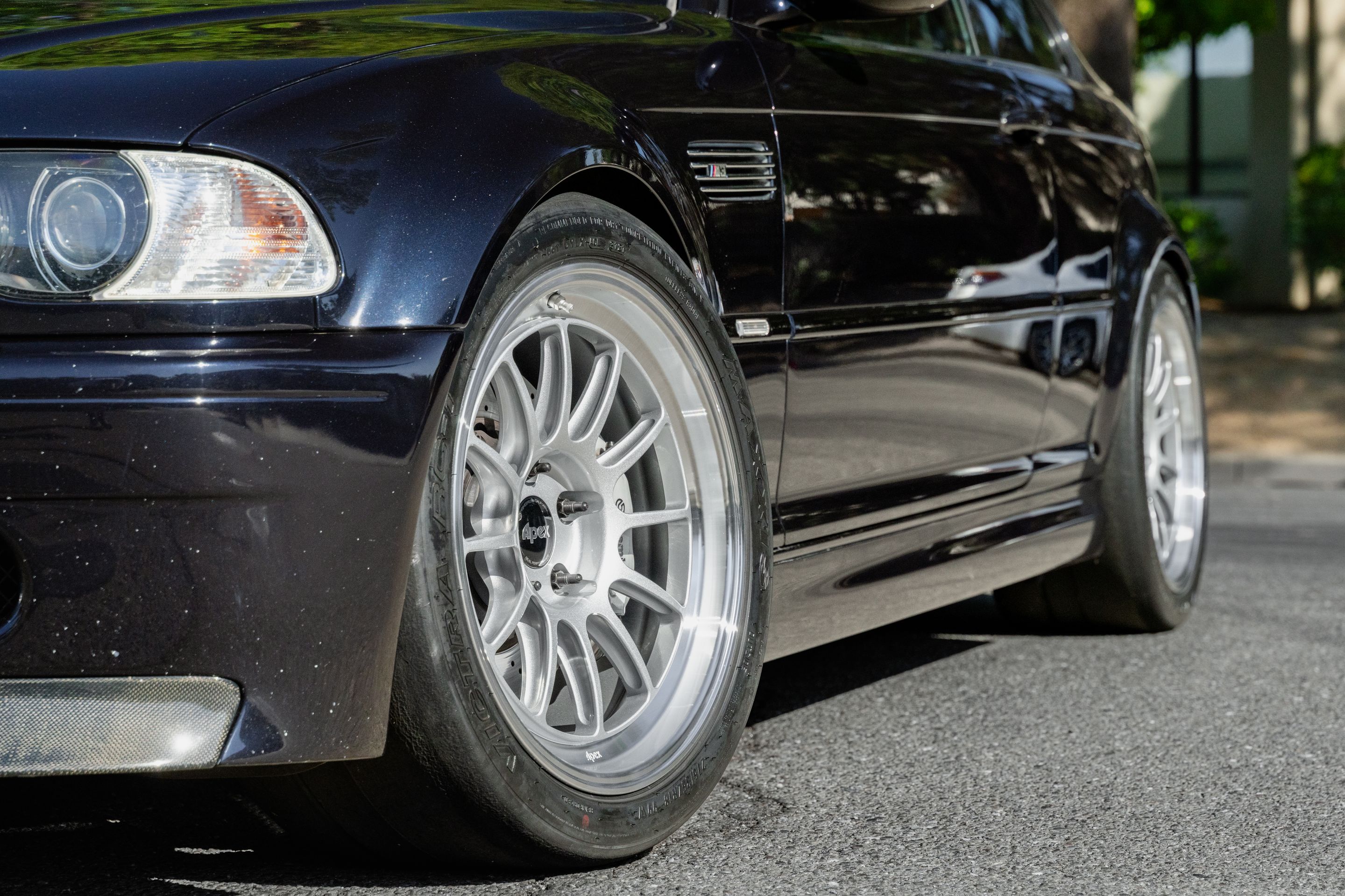 Black BMW E46 M3 with 18" SL-12 Apex wheels in Machined Lip Race Silver