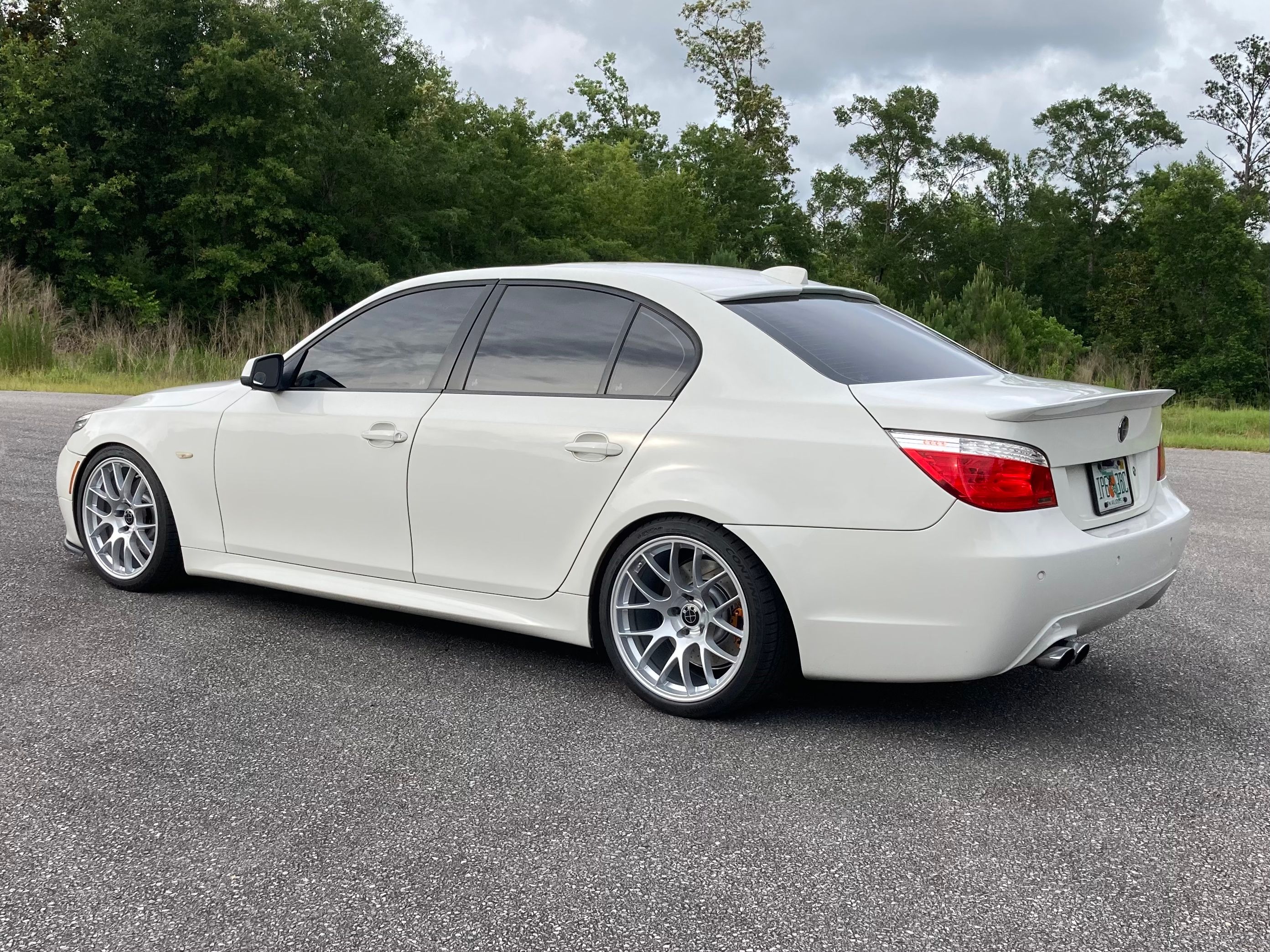White BMW E60 Sedan 5 Series with 19" EC-7 Apex wheels in Race Silver