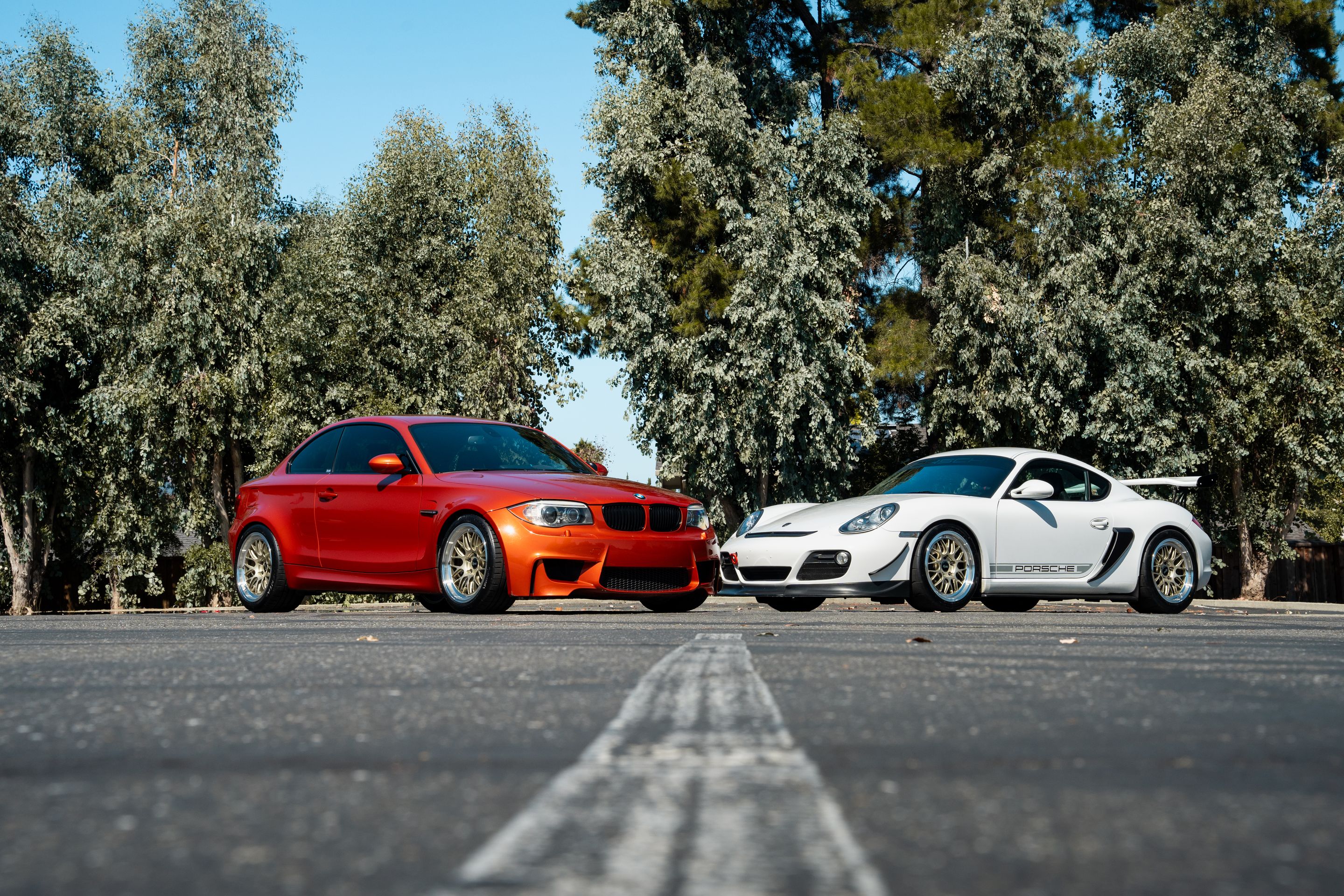 Orange BMW E82 1M with 18" ML-10RT Apex wheels in Machined Lip Gloss Motorsport Gold