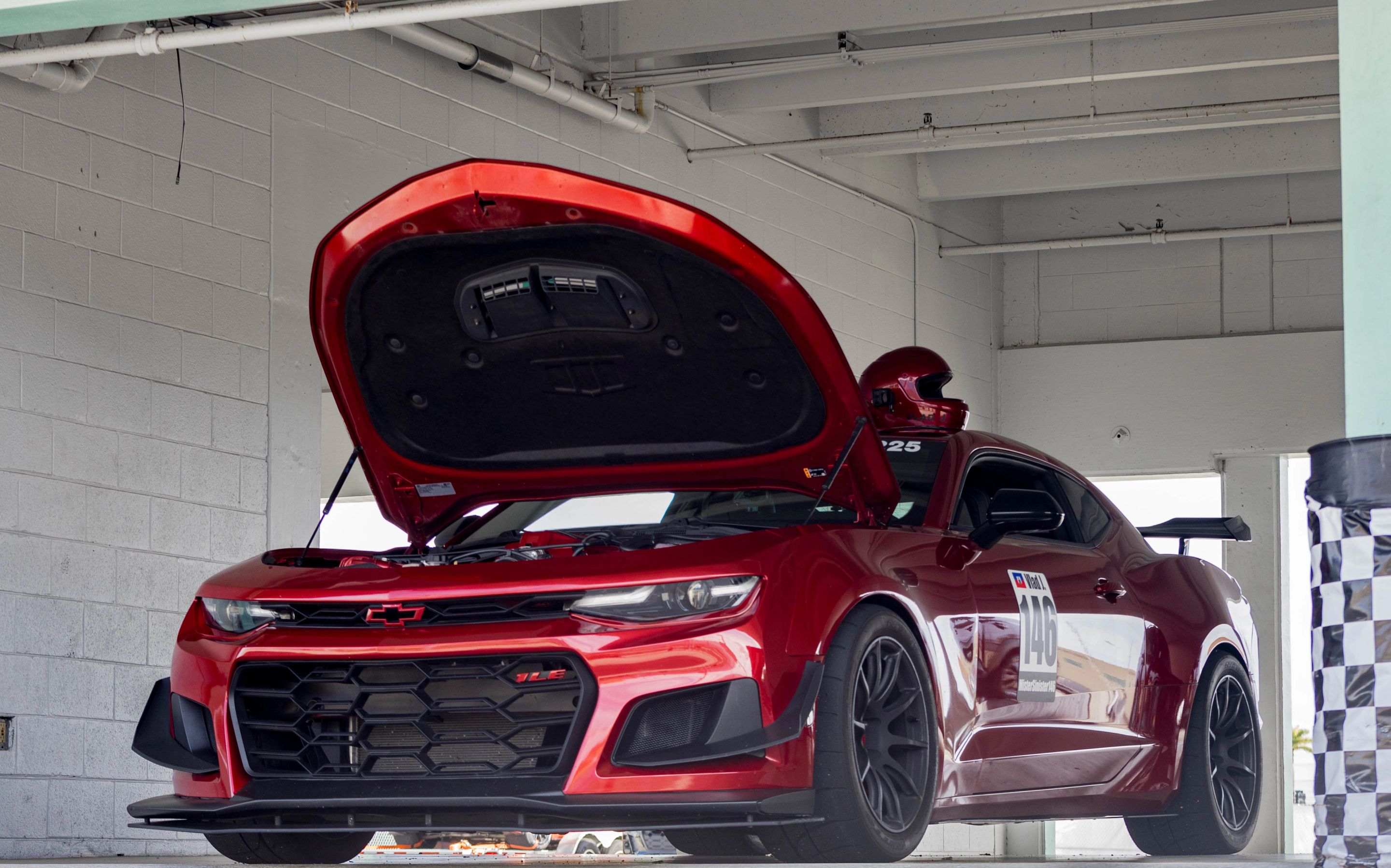 Red Chevrolet 6th Gen Camaro SS with 19" SM-10 Apex wheels in Satin Black