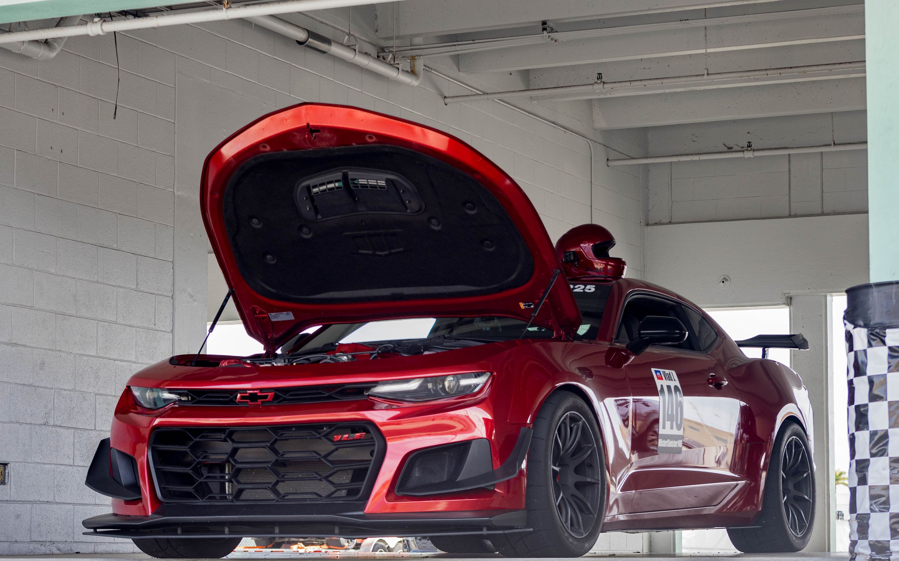 Red Chevrolet 6th Gen Camaro SS with 19" SM-10 Apex wheels in Satin Black