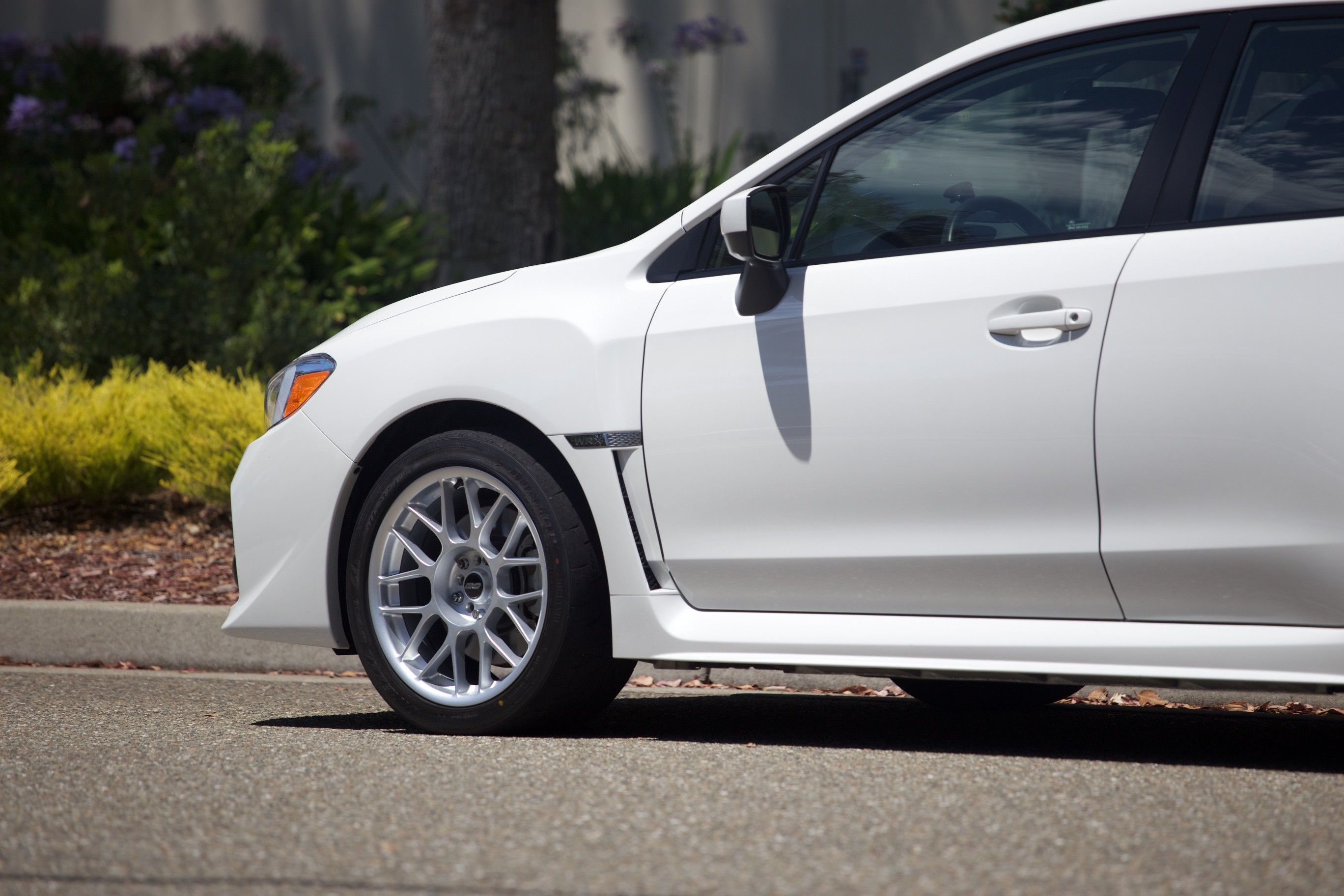 White Subaru VA WRX with 17" ARC-8 Apex wheels in Anthracite