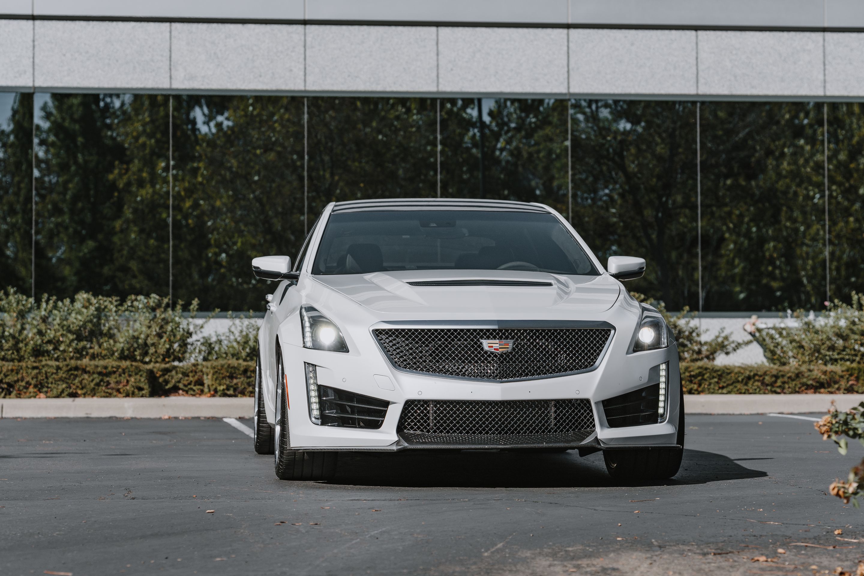 White Cadillac Gen 3 CTS-V with 19" SM-10RS Apex wheels in Brushed Clear