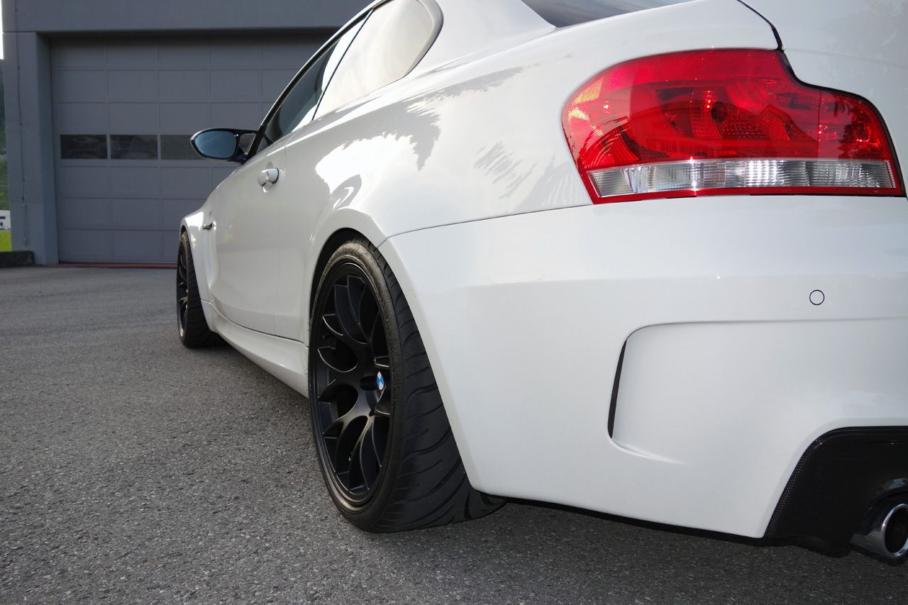 White BMW E82 1M with 18" EC-7 Apex wheels in Satin Black