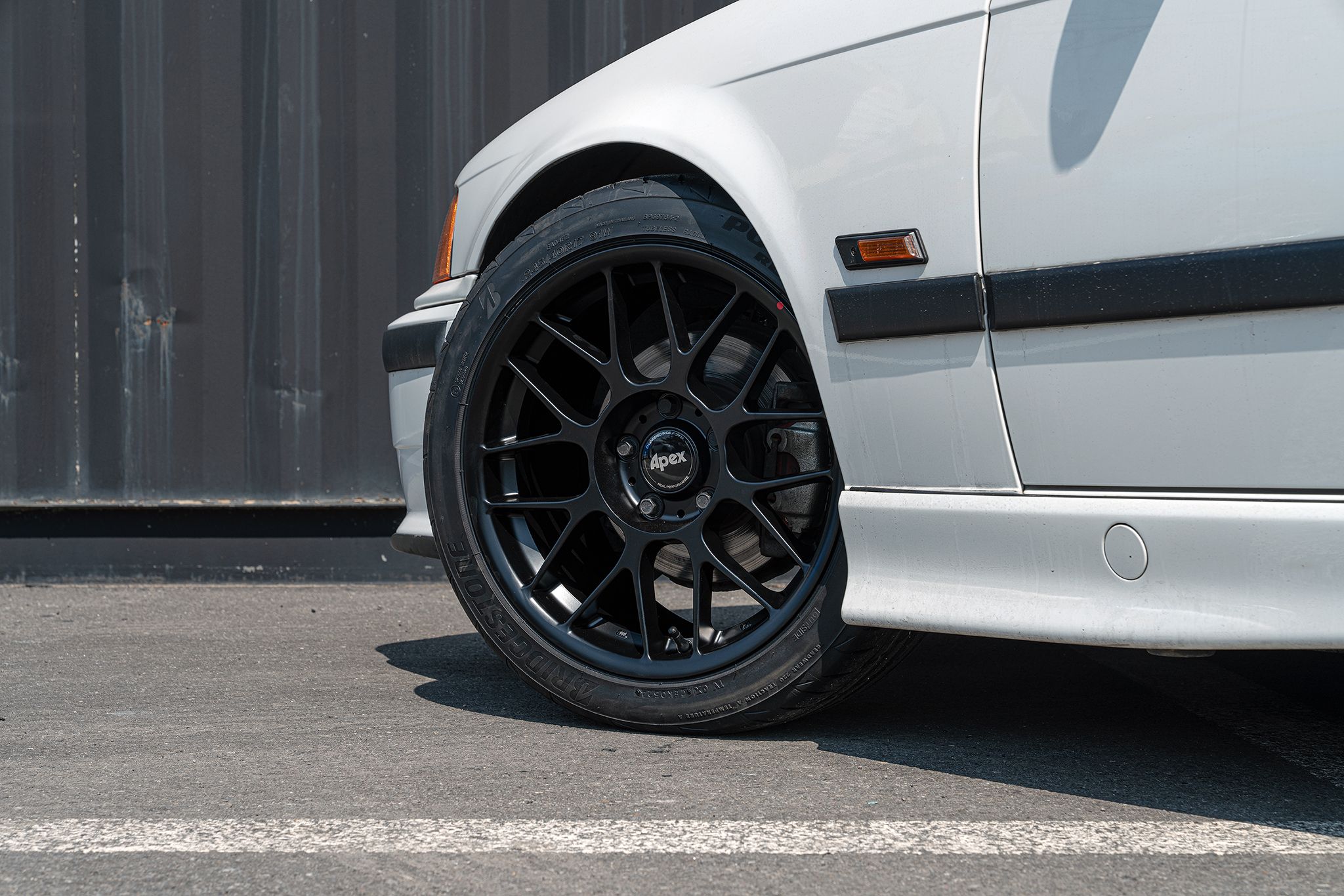 White BMW E36 3 Series with 17" ARC-8 Apex wheels in Satin Black