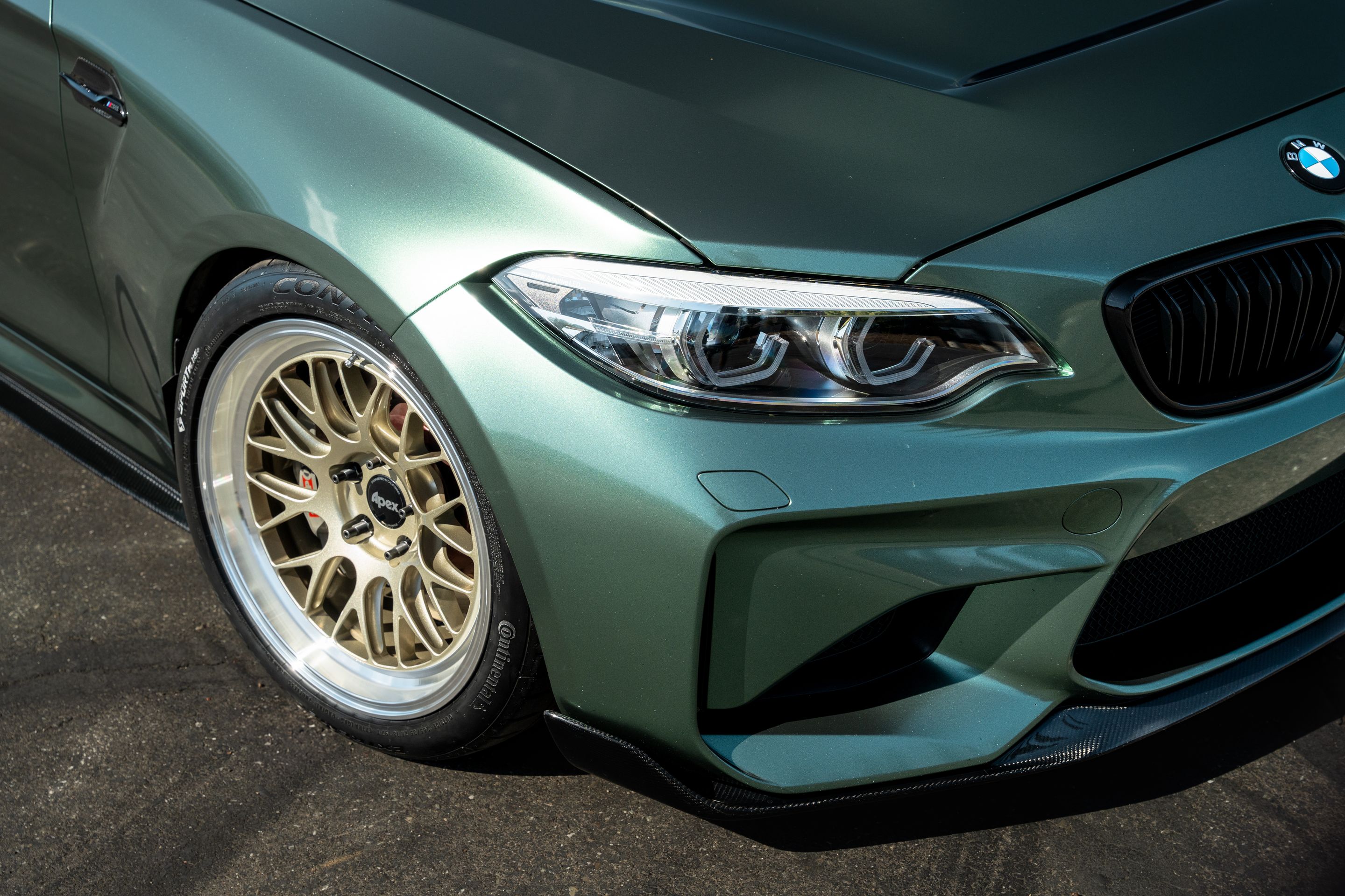 Green BMW F87 M2 with 18" ML-10RT Apex wheels in Machined Lip Gloss Motorsport Gold