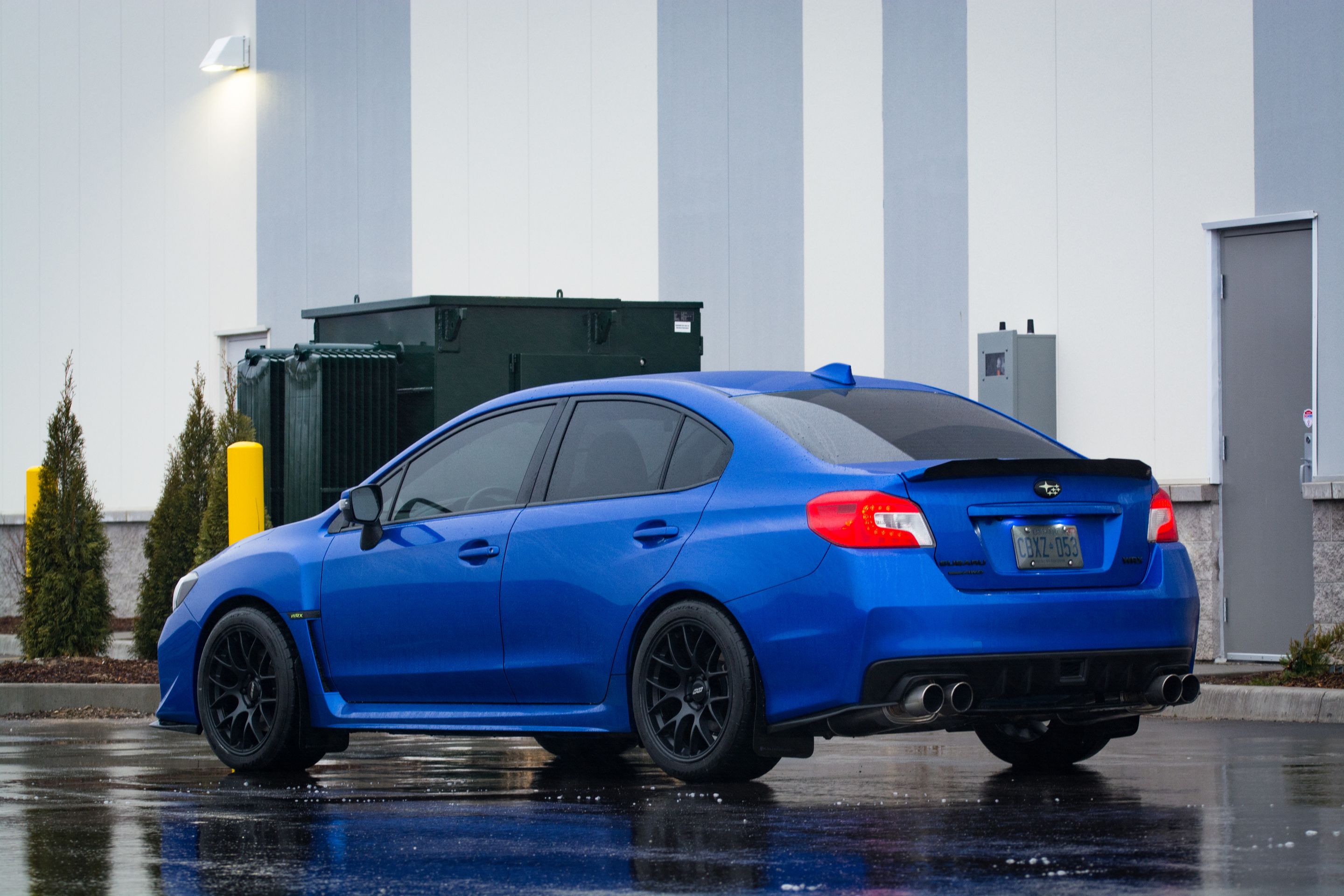 Blue Subaru VA WRX with 18" EC-7 Apex wheels in Satin Black