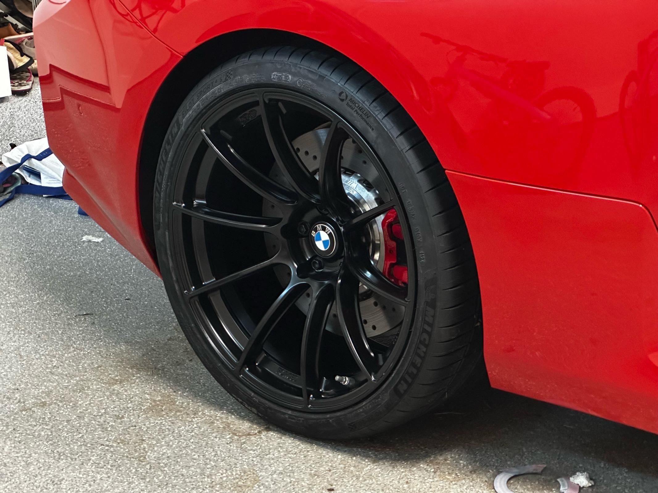 Red BMW G87 M2 with 19"/20" SM-10RS Apex wheels in Satin Black