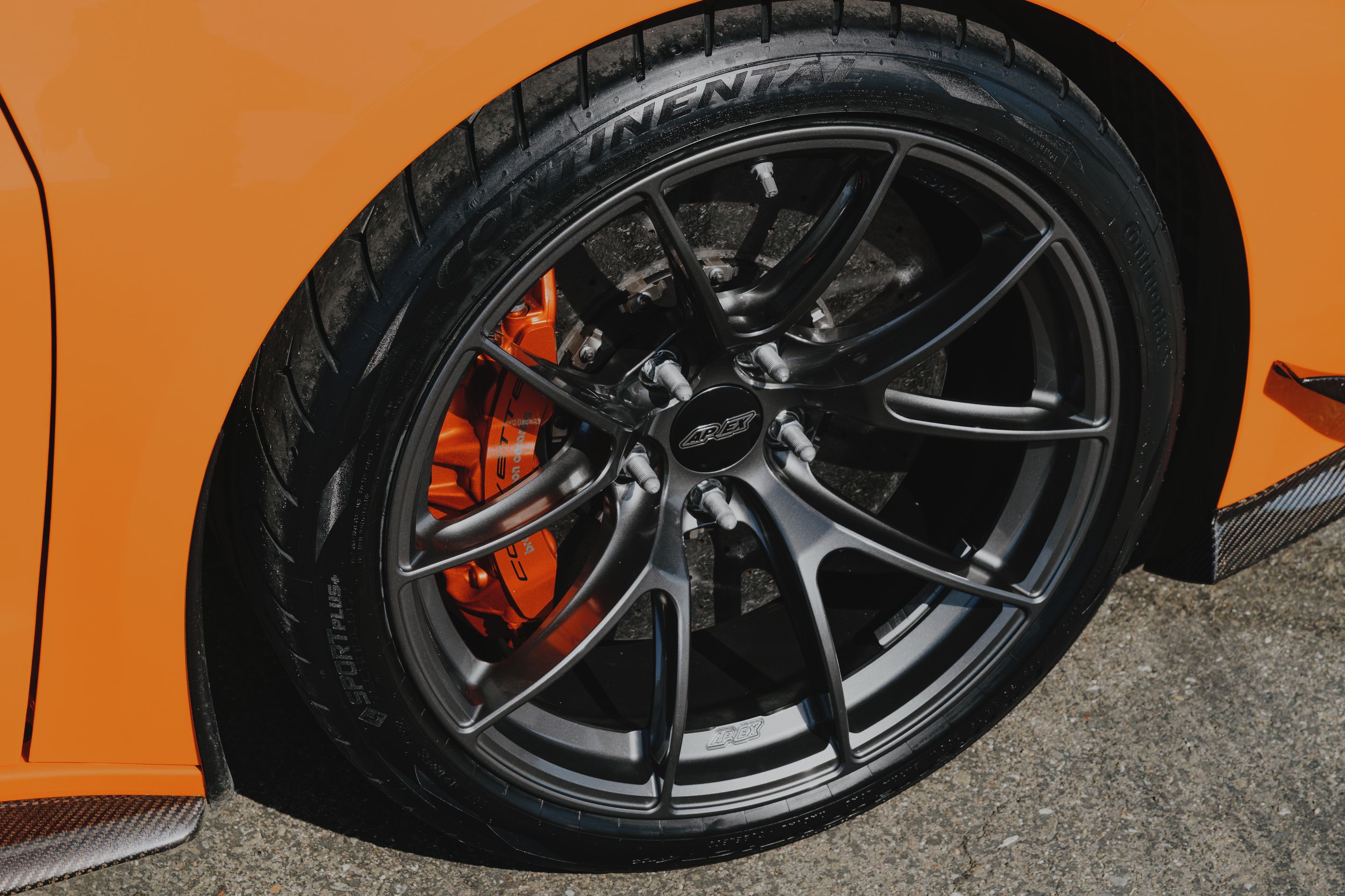 Orange Chevrolet C8 Corvette Z06 with 19" VS-5RS Apex wheels in Anthracite