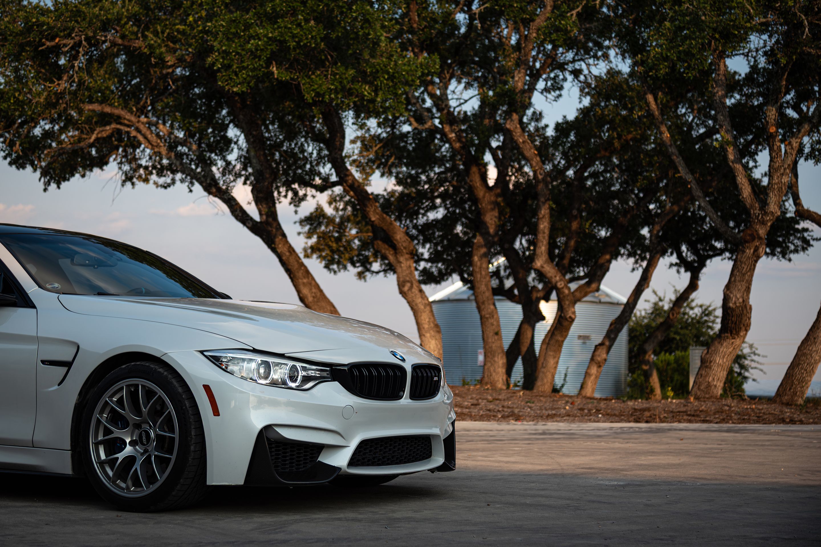 White BMW F82 Coupe M4 with 18" EC-7 Apex wheels in Race Silver