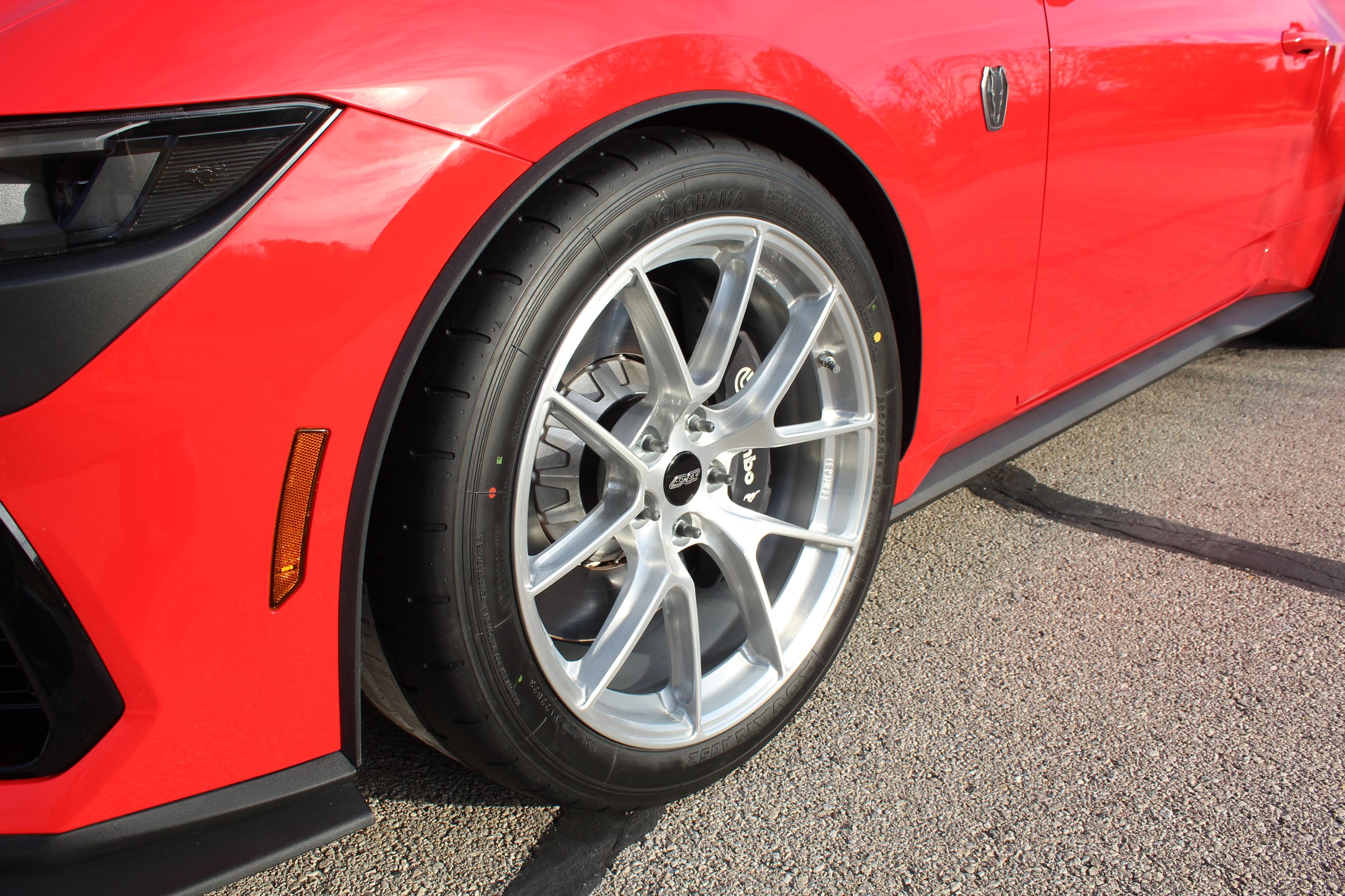 Red Ford S650 Mustang Dark Horse with 19" VS-5RS Apex wheels in Brushed Clear