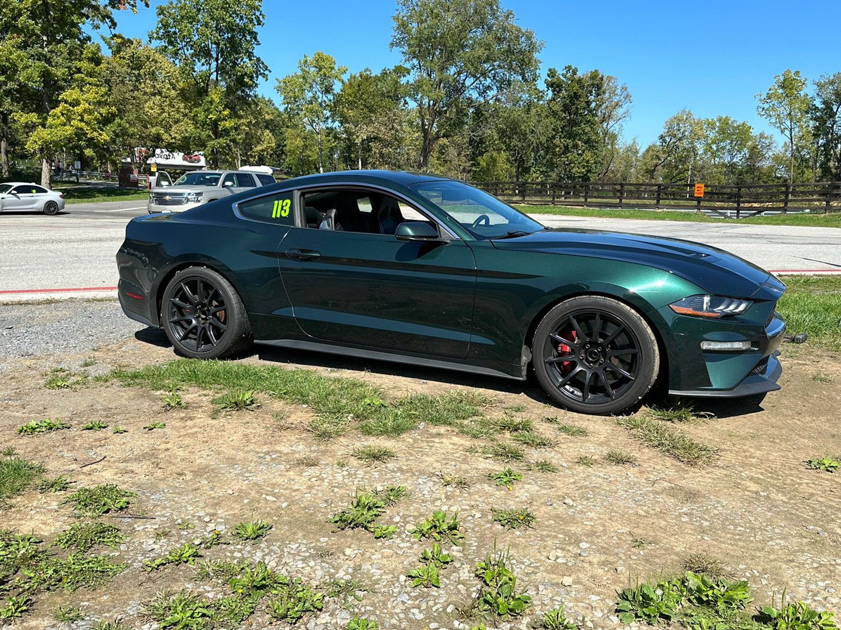 Green Ford S550 Mustang Bullitt with 19" SM-10 Apex wheels in Satin Black
