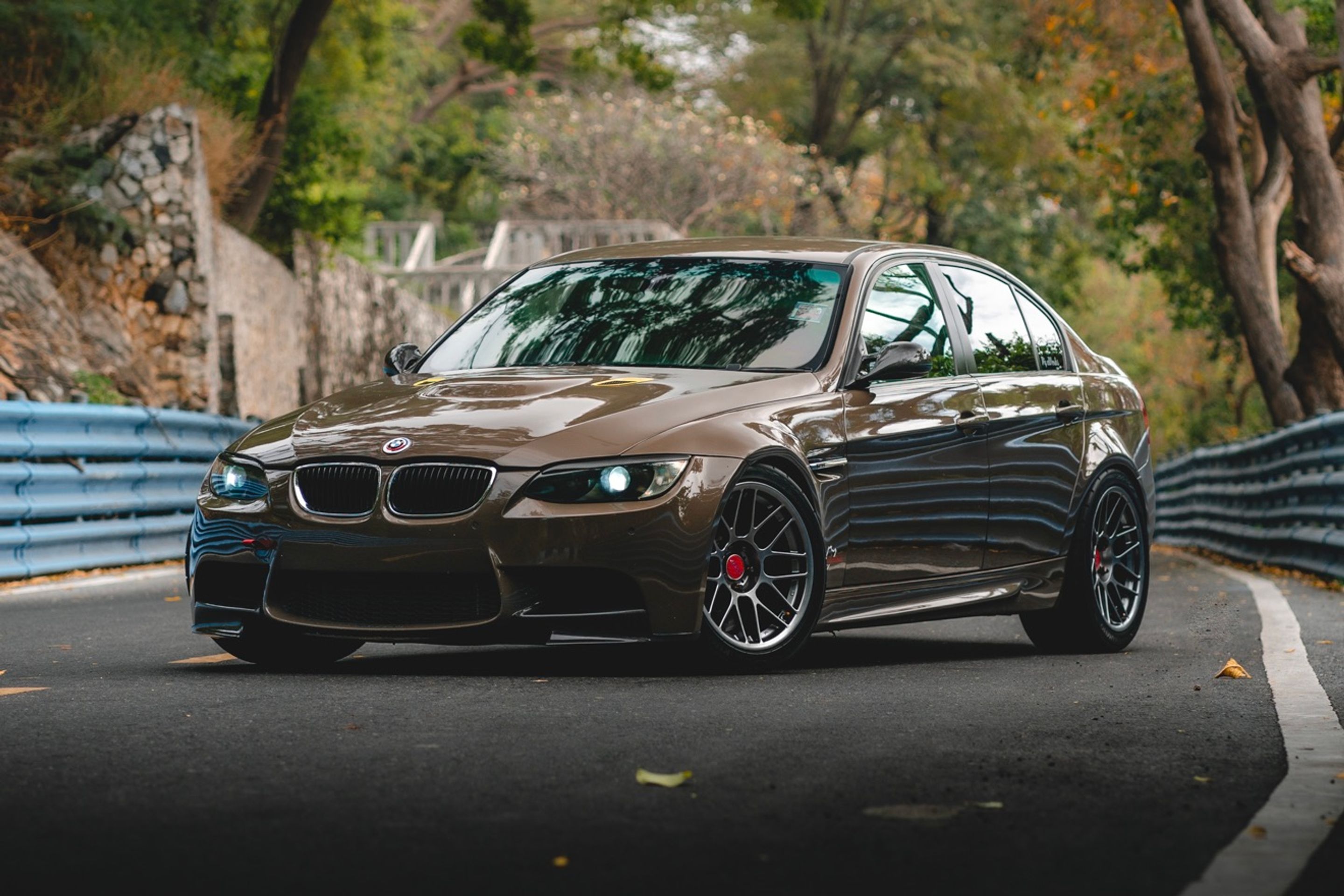 Brown BMW E90 Sedan 3 Series with 18" ARC-8 Apex wheels in Hyper Black