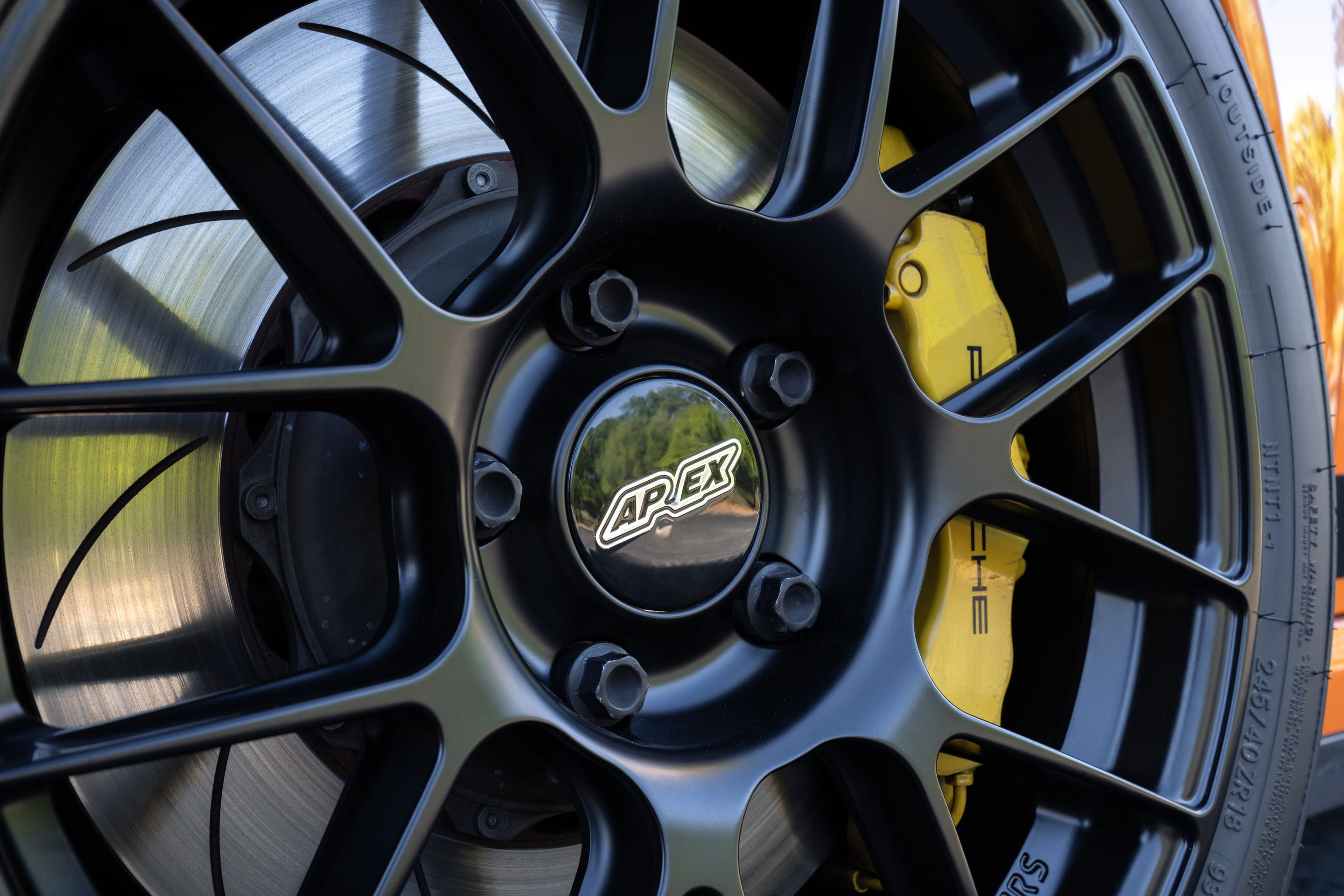 Orange Porsche 911 997 GT3 RS with 18" EC-7RS Apex wheels in Satin Black