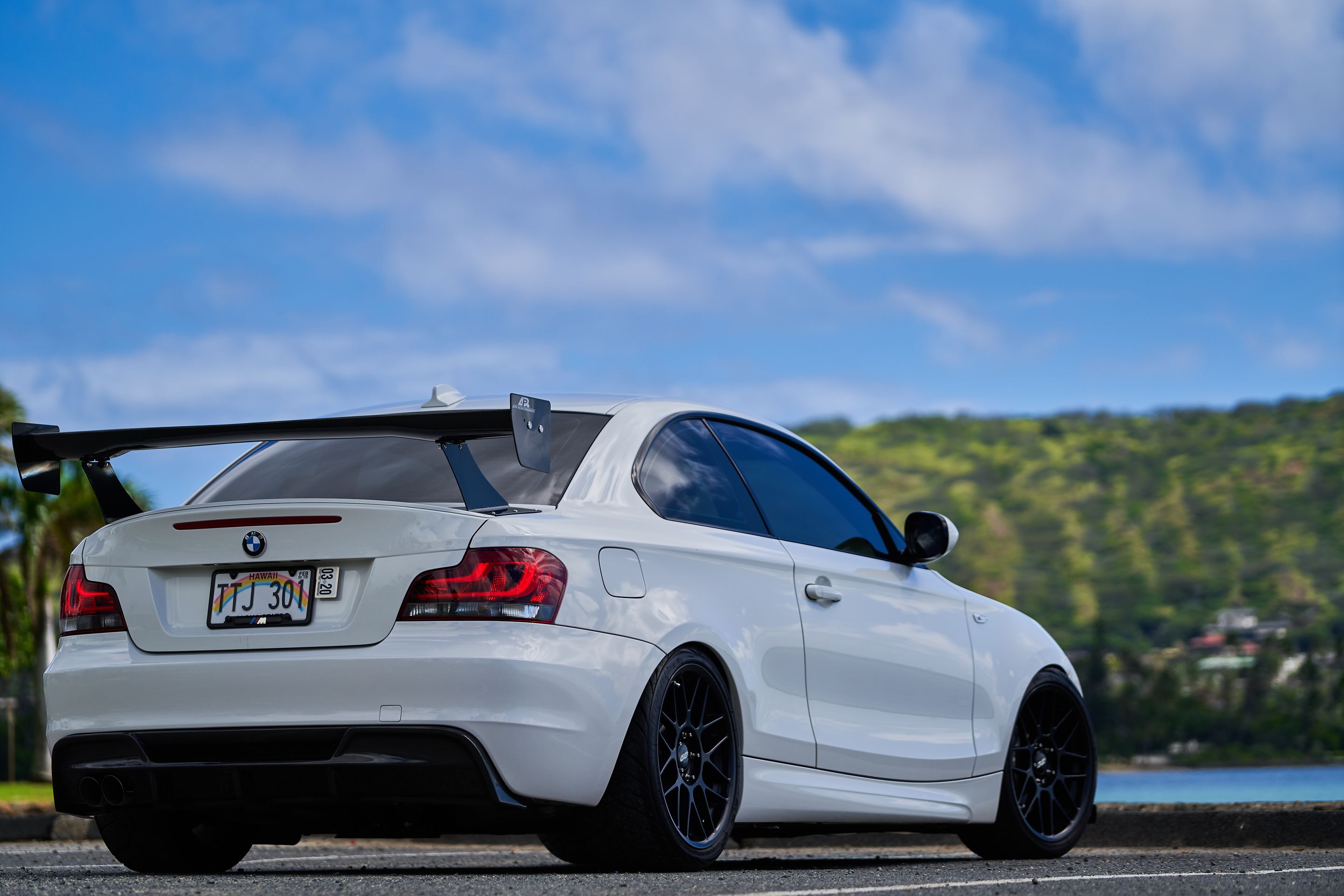 White BMW E82 Coupe 1 Series with 18" ARC-8 Apex wheels in Satin Black