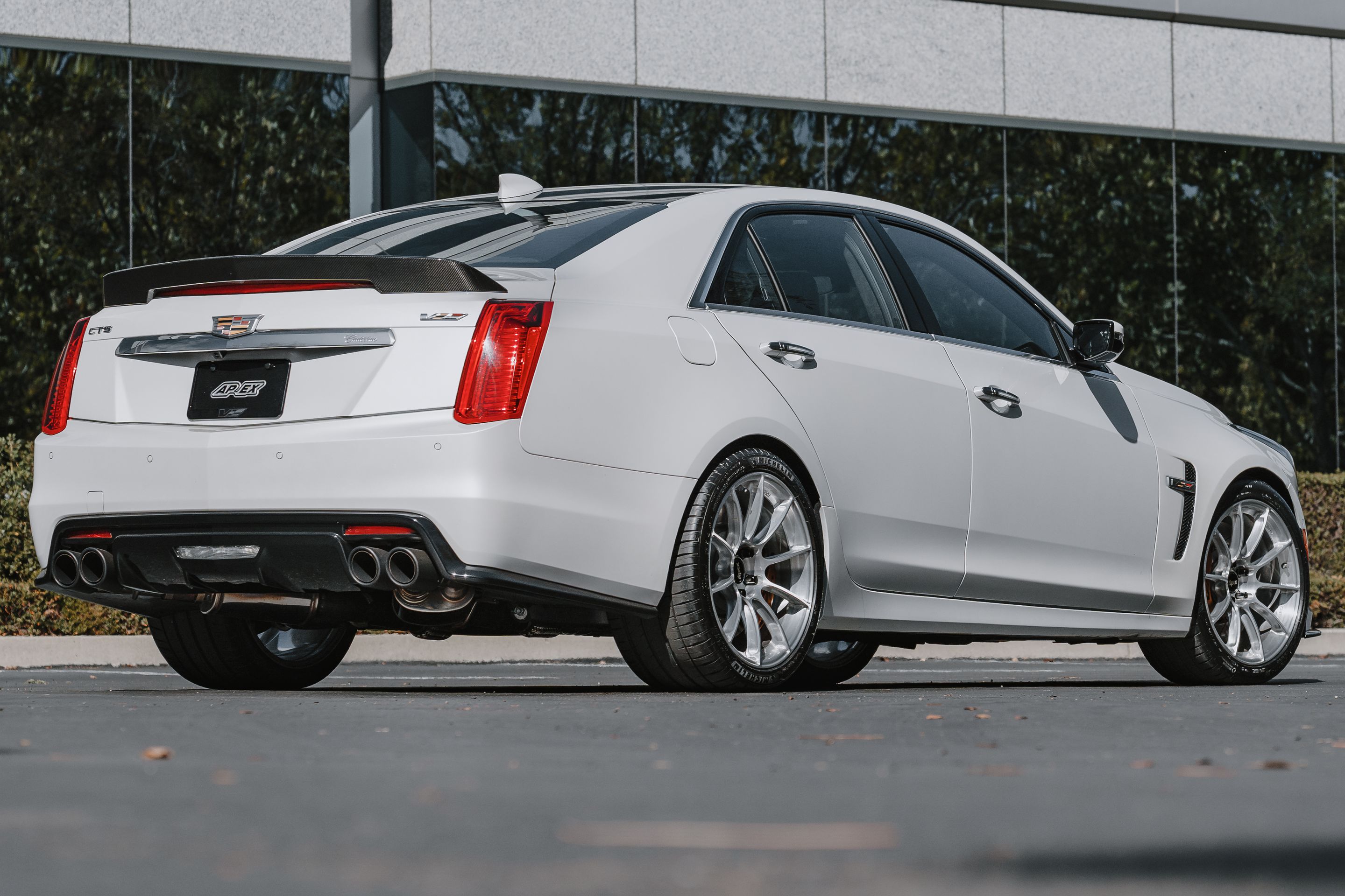 White Cadillac Gen 3 CTS-V with 19" SM-10RS Apex wheels in Brushed Clear