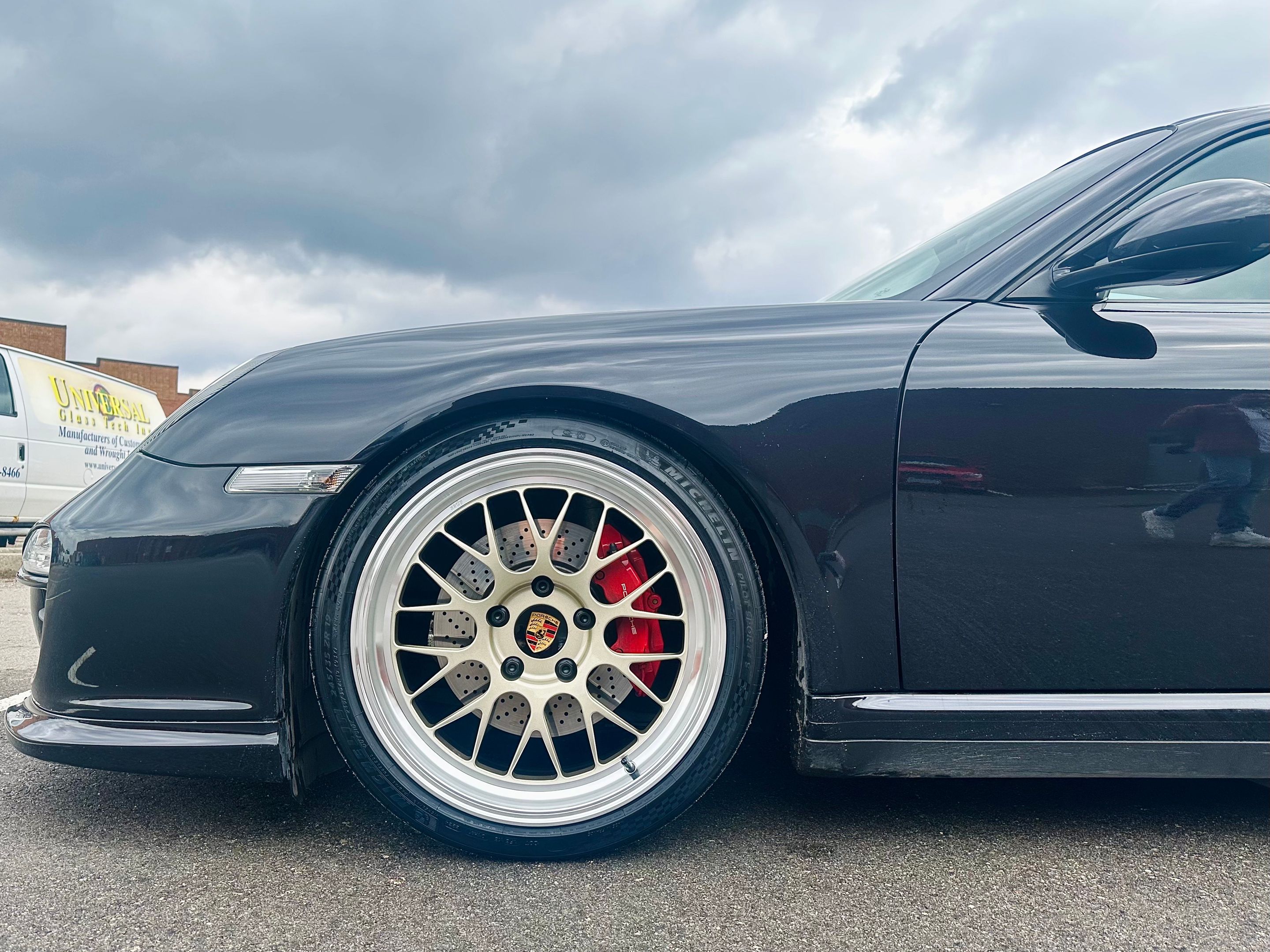 Black Porsche 911 997 Carrera 4S with 19" ML-10RT Apex wheels in Machined Lip Gloss Motorsport Gold