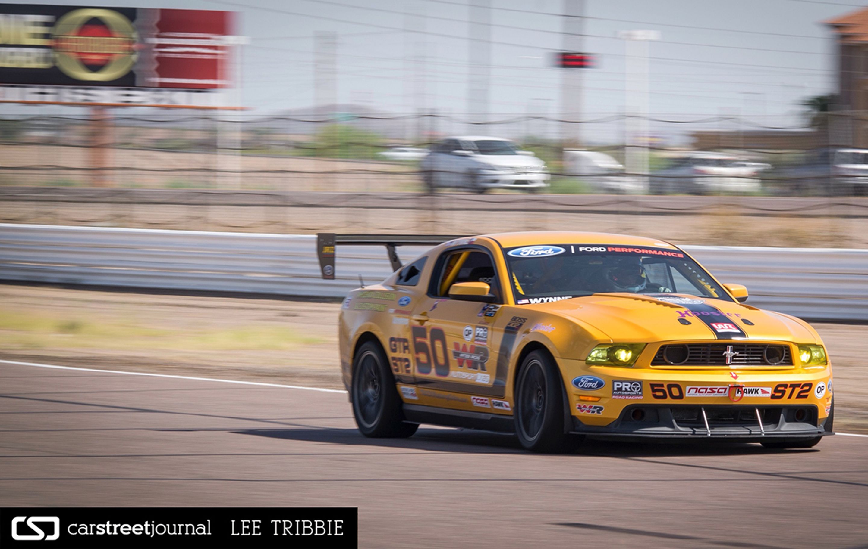 Yellow Ford S197 Mustang GT with 18" EC-7 Apex wheels in Anthracite