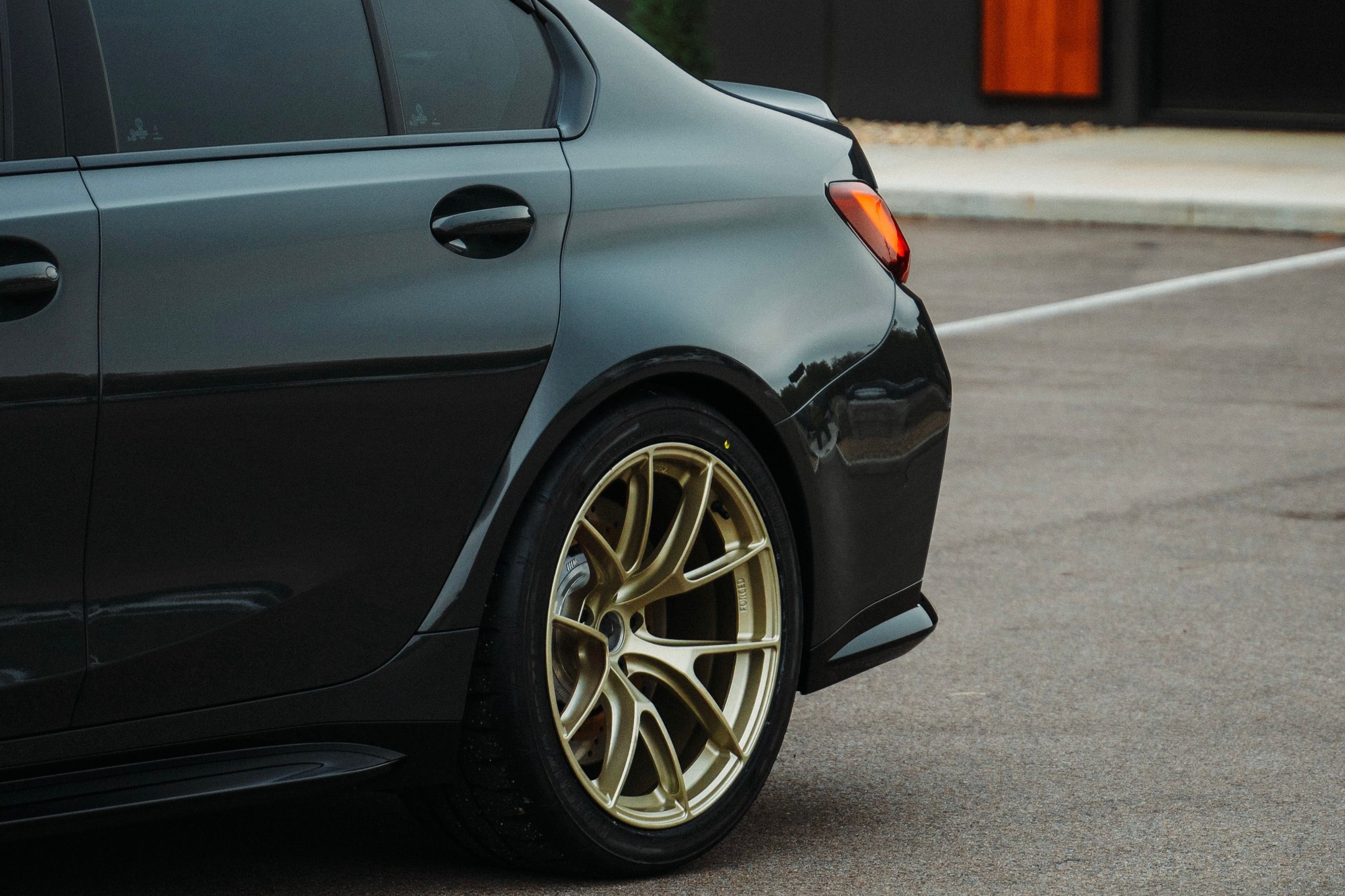 Grey BMW G80 M3 with 19" VS-5RS Apex wheels in Motorsport Gold