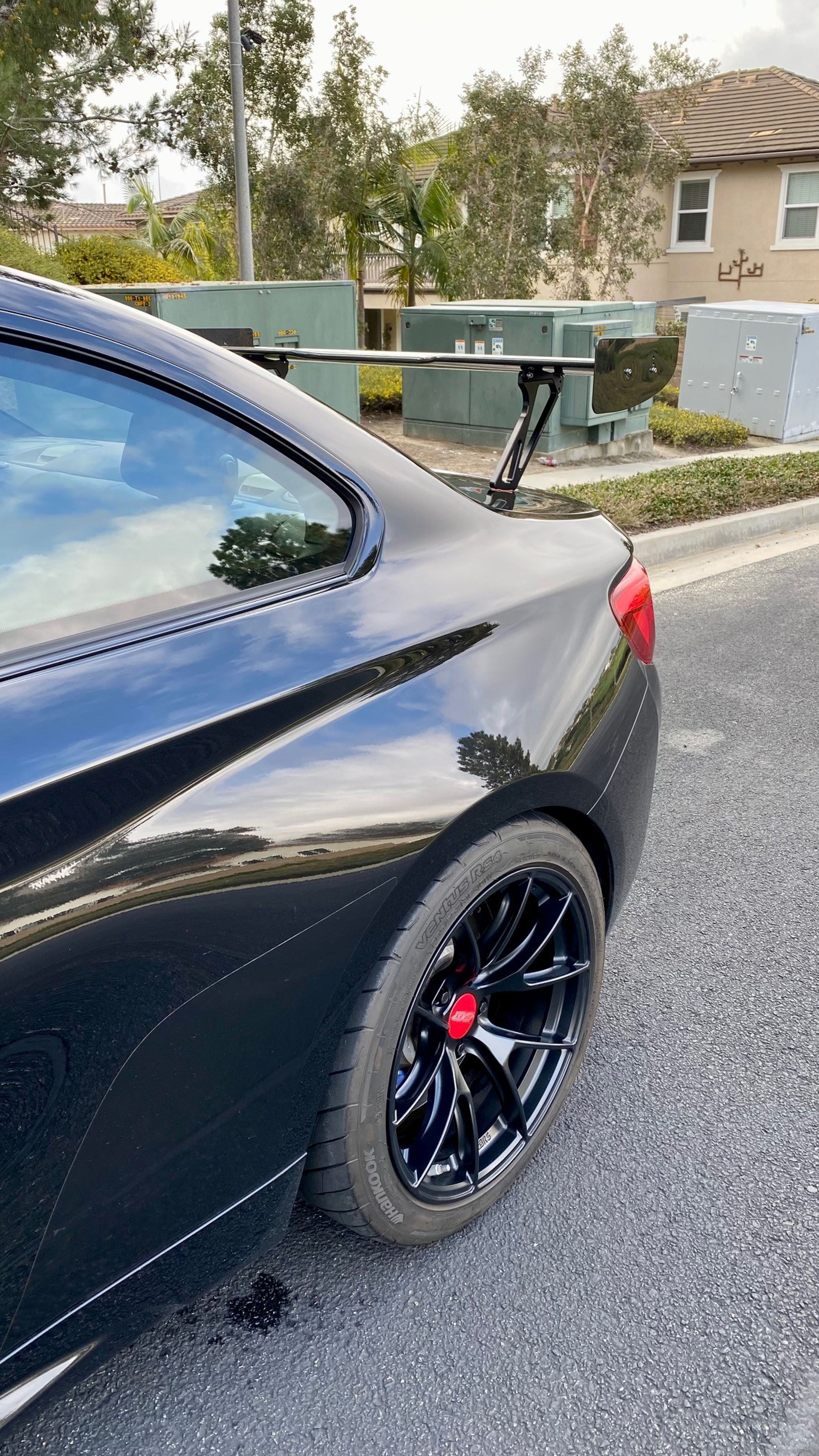 Black BMW F87 M2 with 18" VS-5RS Apex wheels in Satin Black
