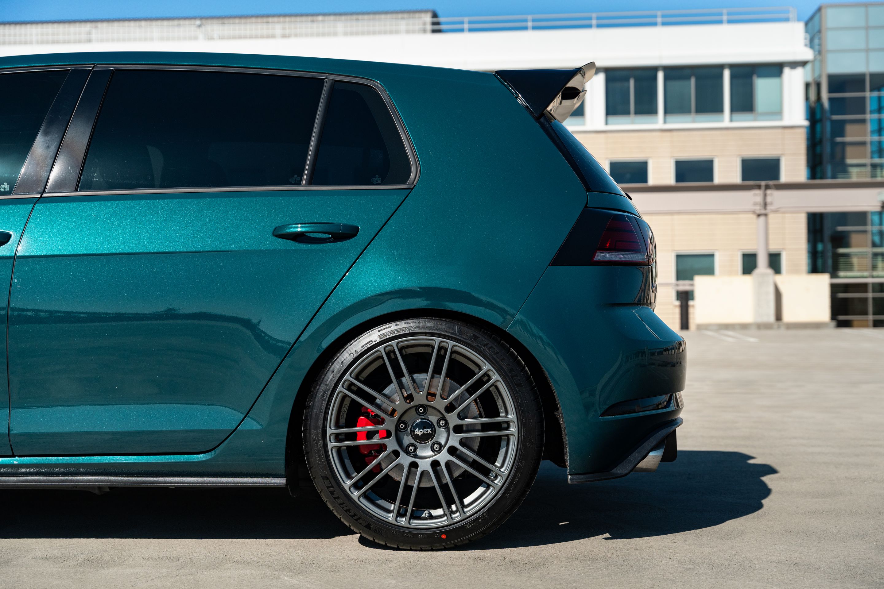 Green VW MK7 GTI with 18" TC-10RT Apex wheels in Anthracite