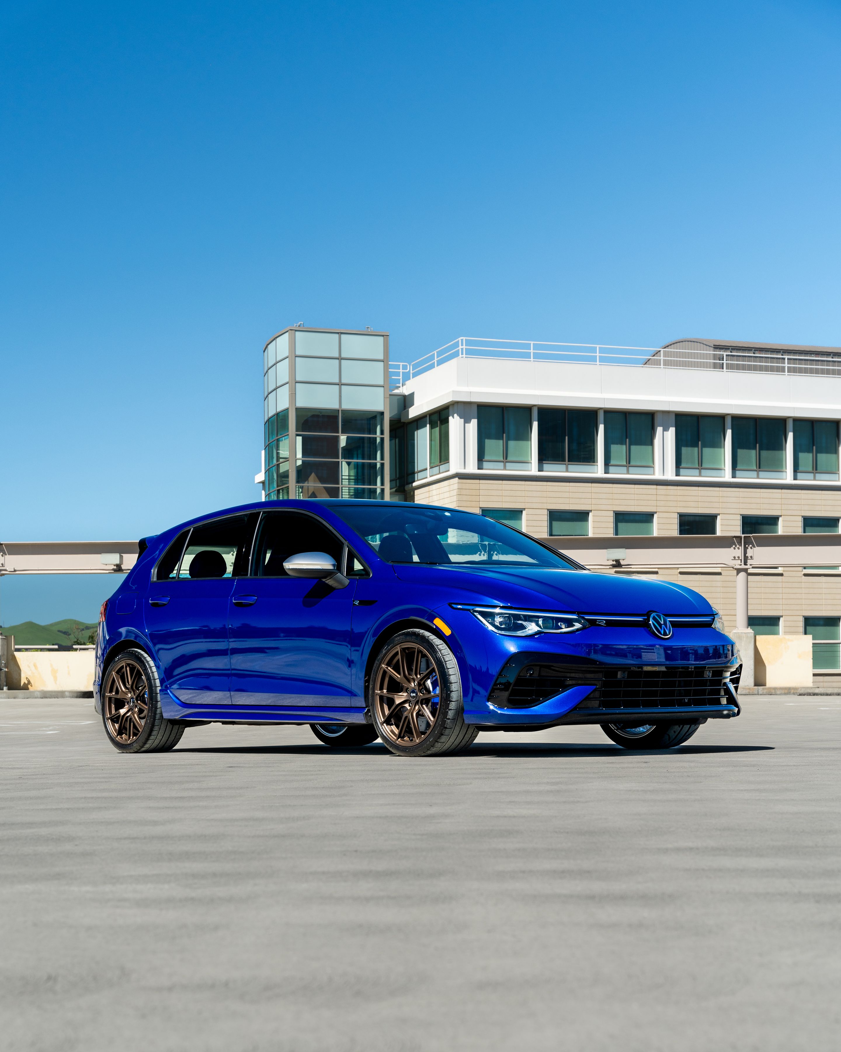 Blue VW MK8 Golf R with 18" VS-5 Apex wheels in Satin Bronze