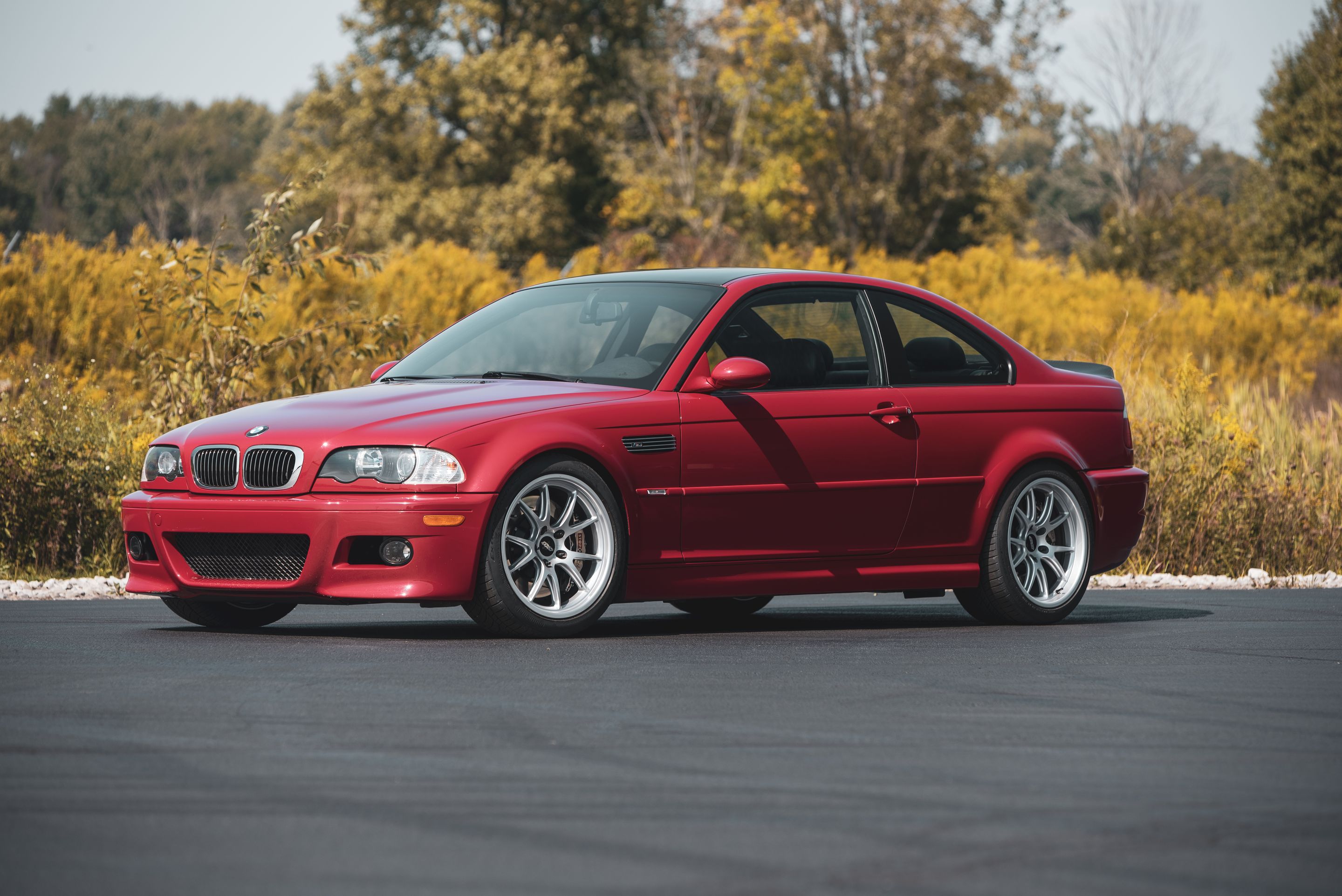 Red BMW E46 M3 with 18" FL-5 Apex wheels in Race Silver
