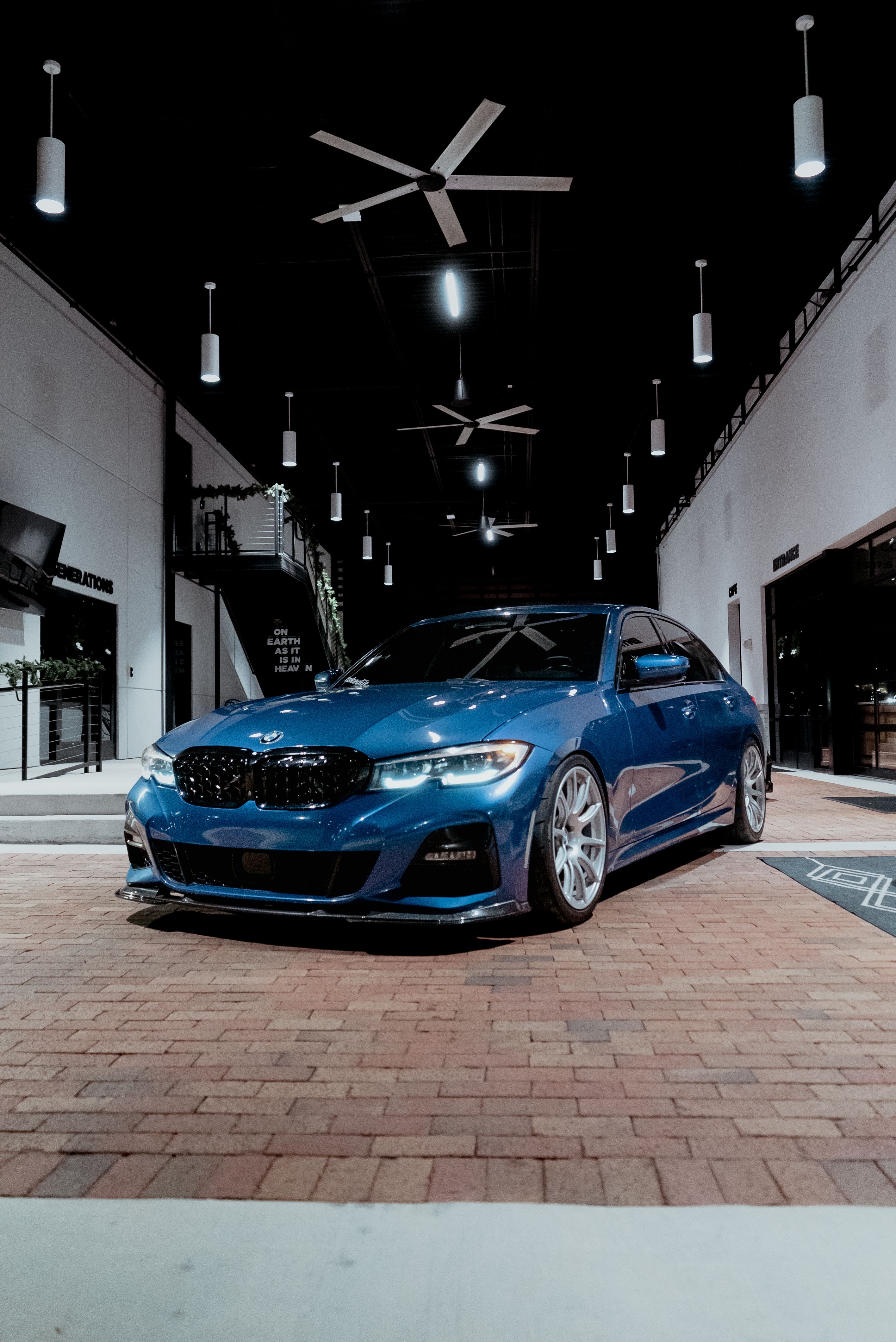 Blue BMW G20 Sedan 3 Series with 19" SM-10 Apex wheels in Race Silver