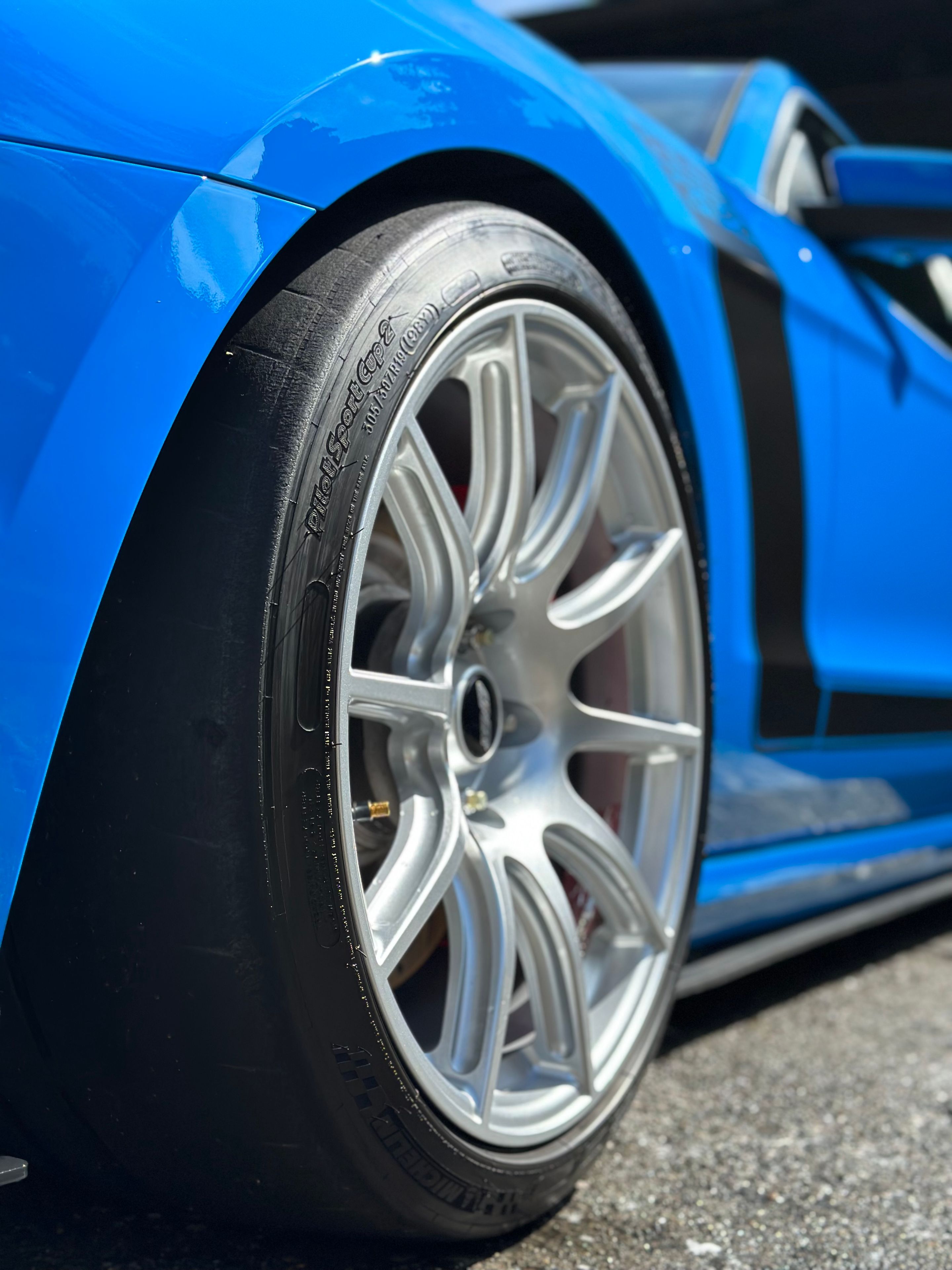 Blue Ford S197 Mustang Boss 302 with 19" SM-10 Apex wheels in Race Silver