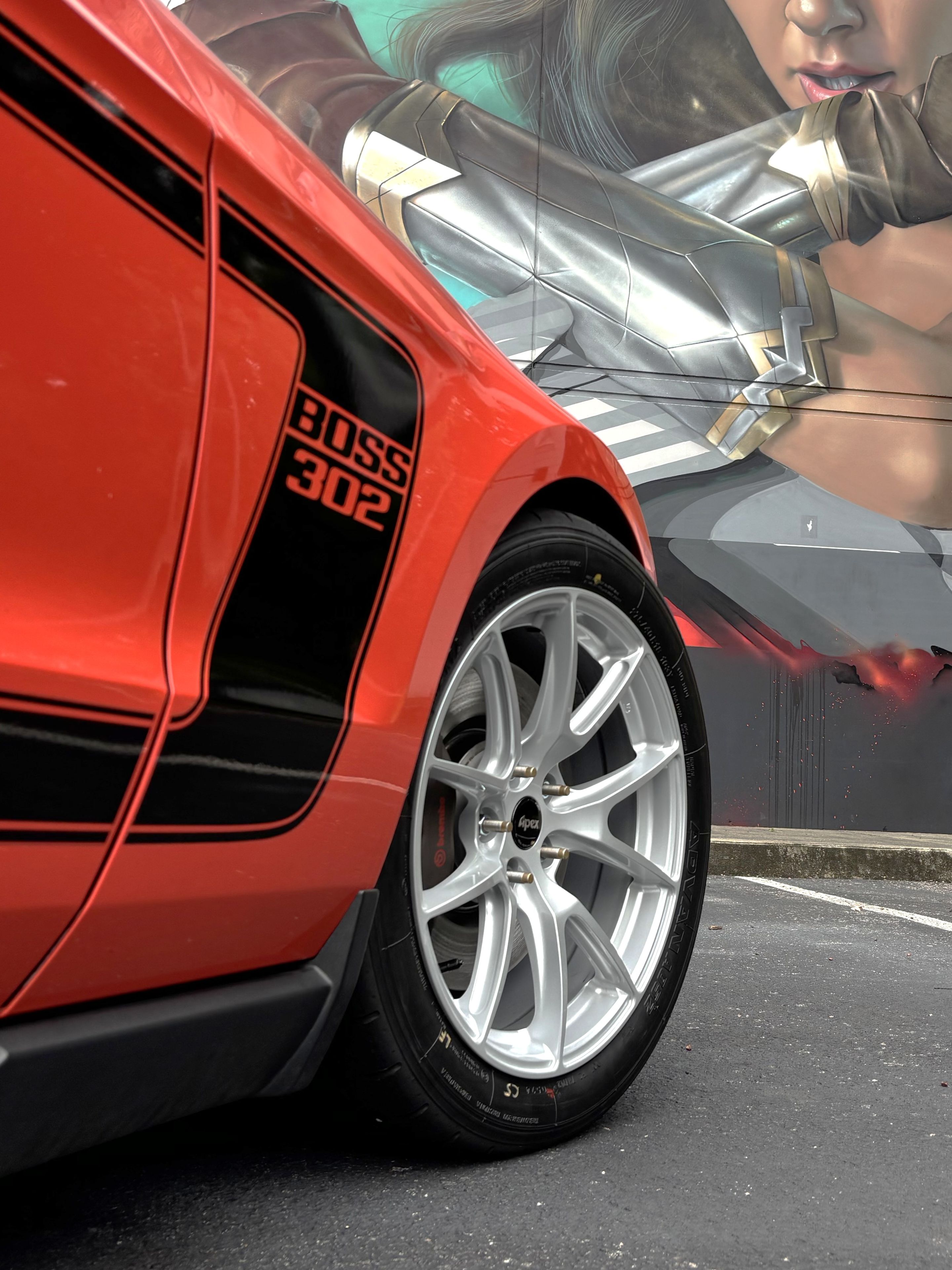 Red Ford S197 Mustang Boss 302 with 18" VS-5 Apex wheels in Race Silver