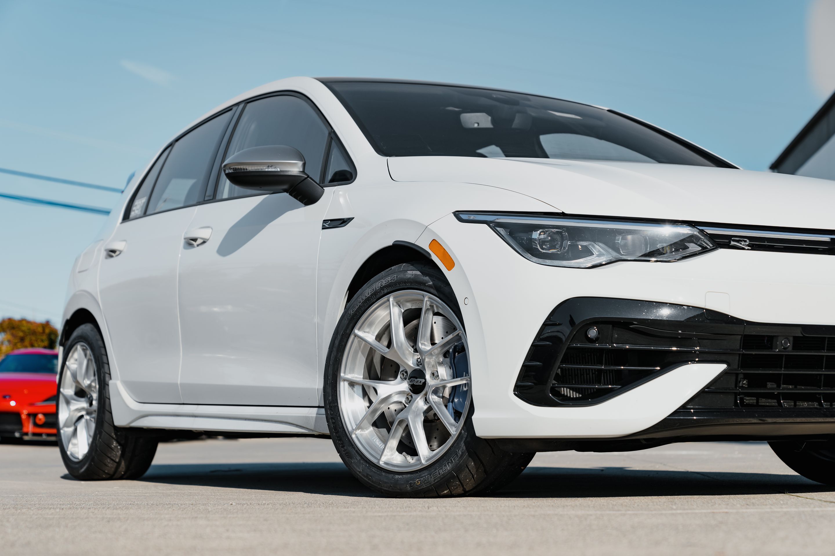 White VW MK8 Golf R with 17" VS-5RS Apex wheels in Brushed Clear
