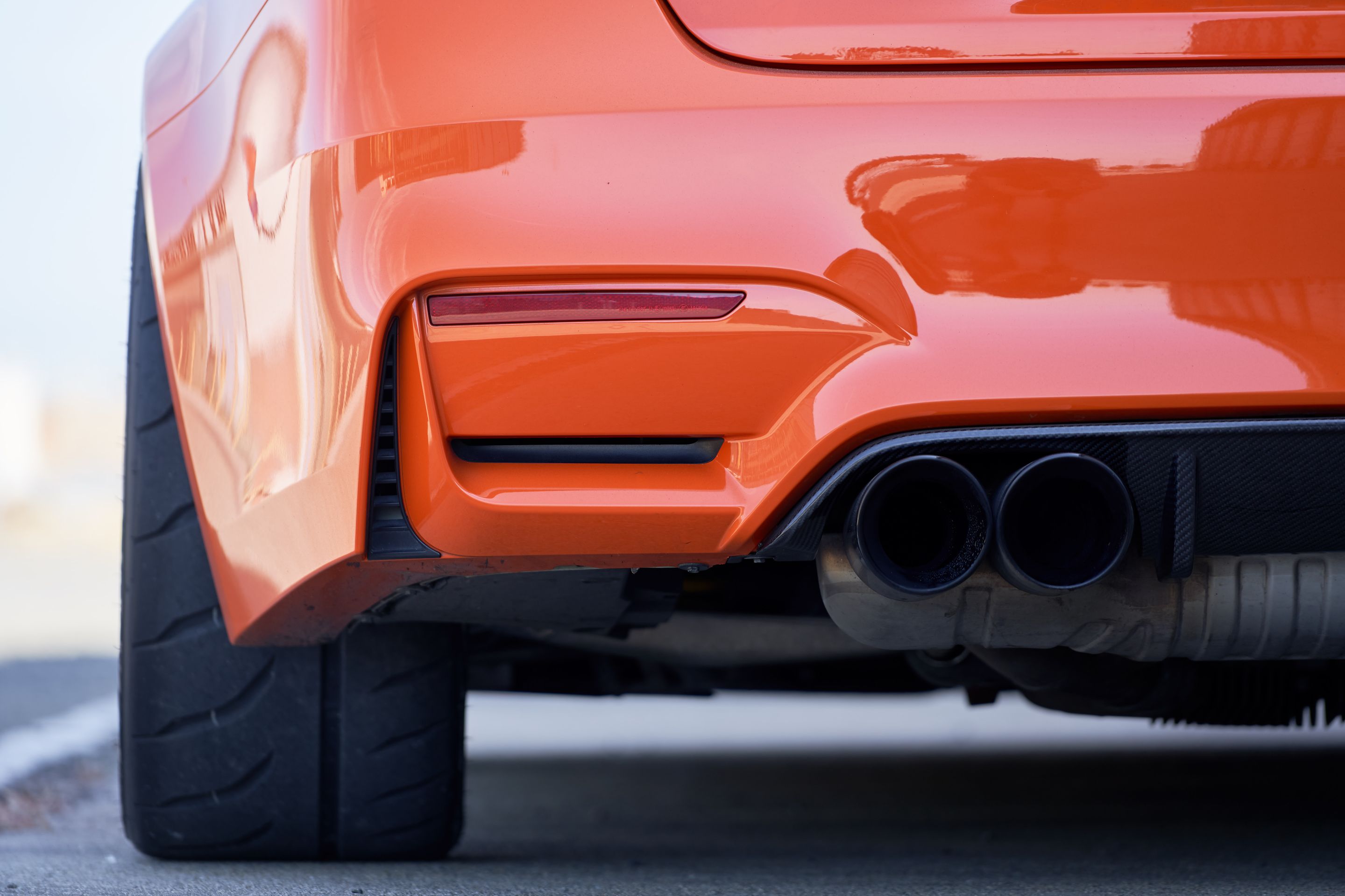 Orange BMW F80 M3 with 18" EC-7R Apex wheels in Brushed Clear