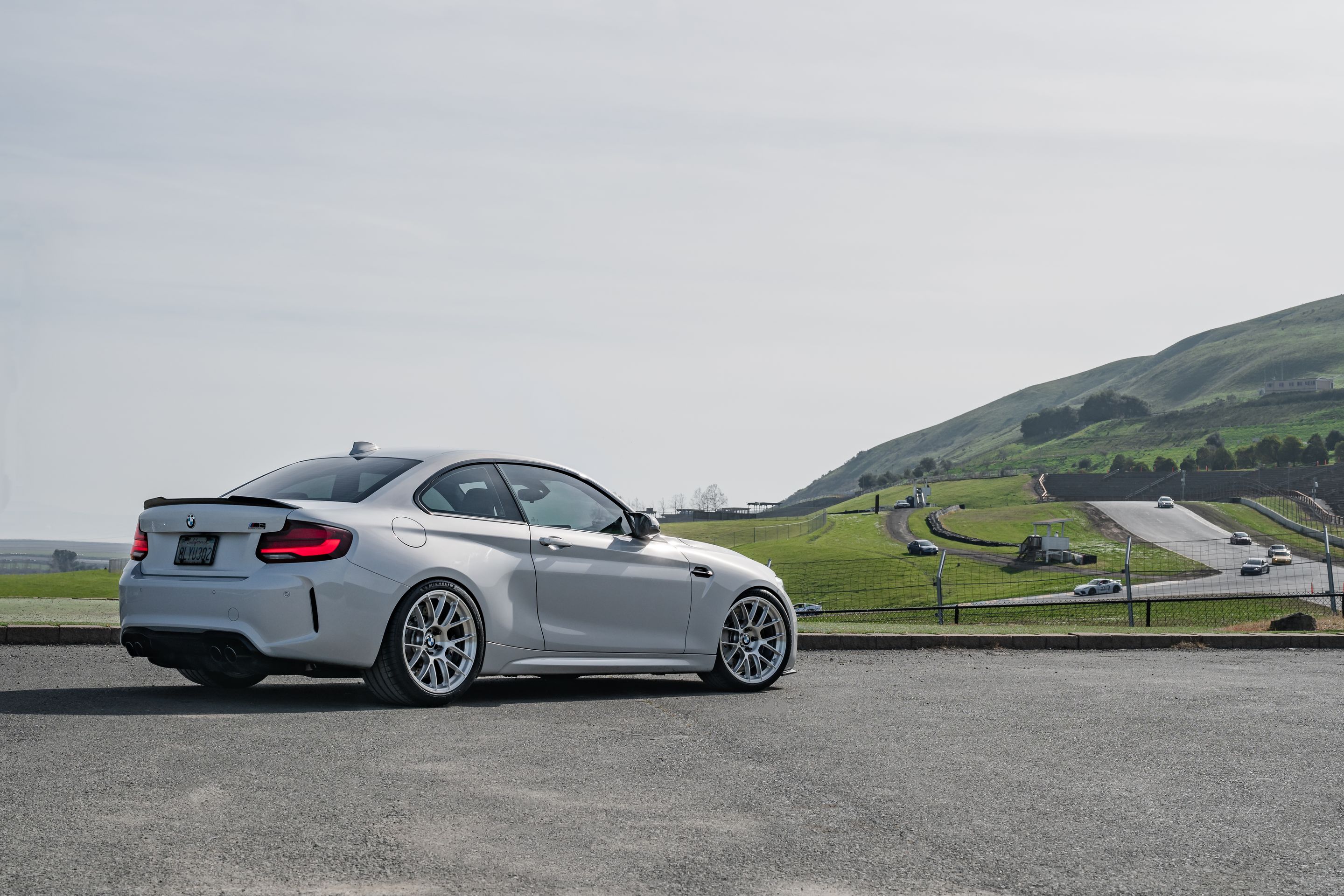 Silver BMW F87 M2 with 19" EC-7RS Apex wheels in Brushed Clear