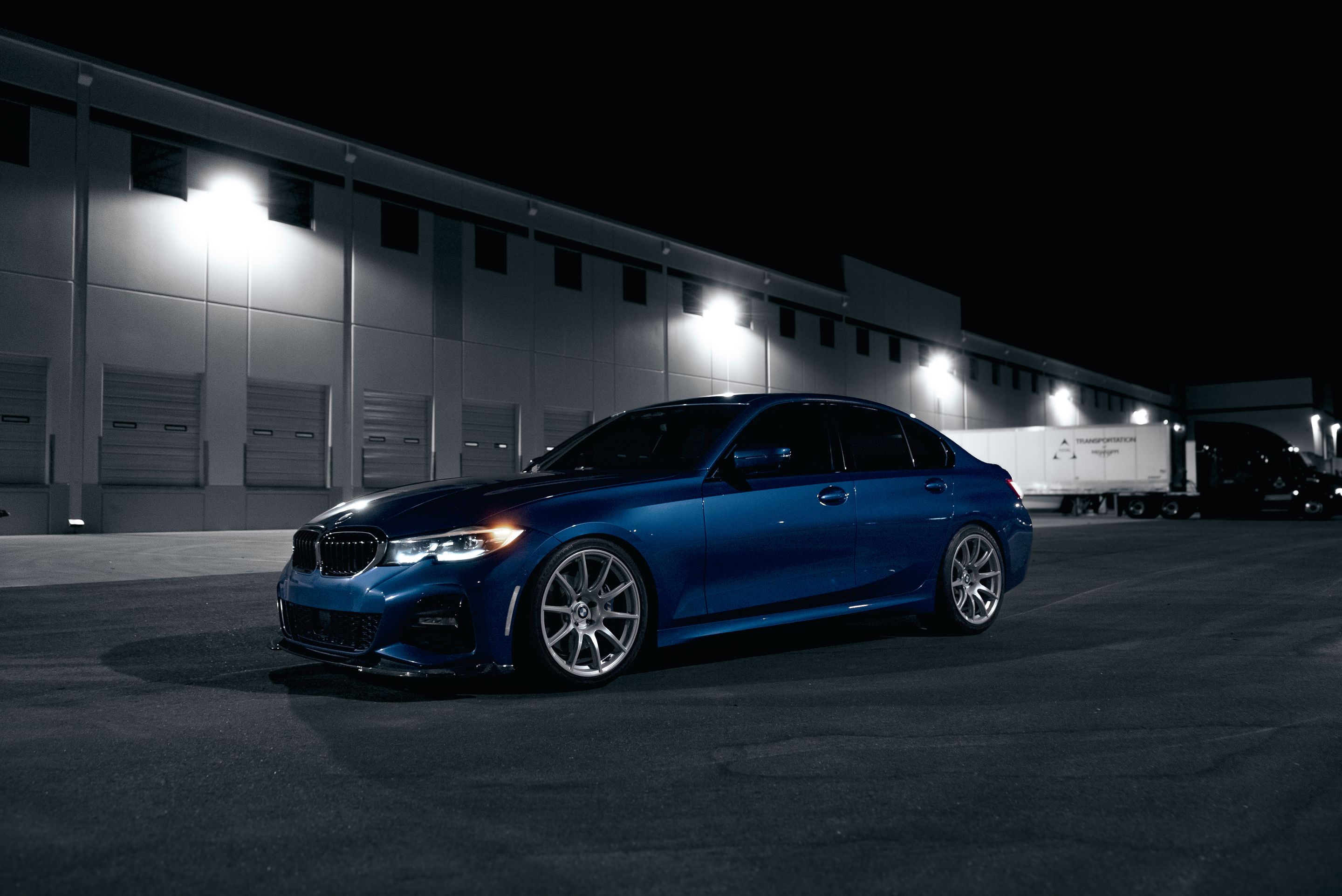 Blue BMW G20 Sedan 3 Series with 19" SM-10 Apex wheels in Race Silver