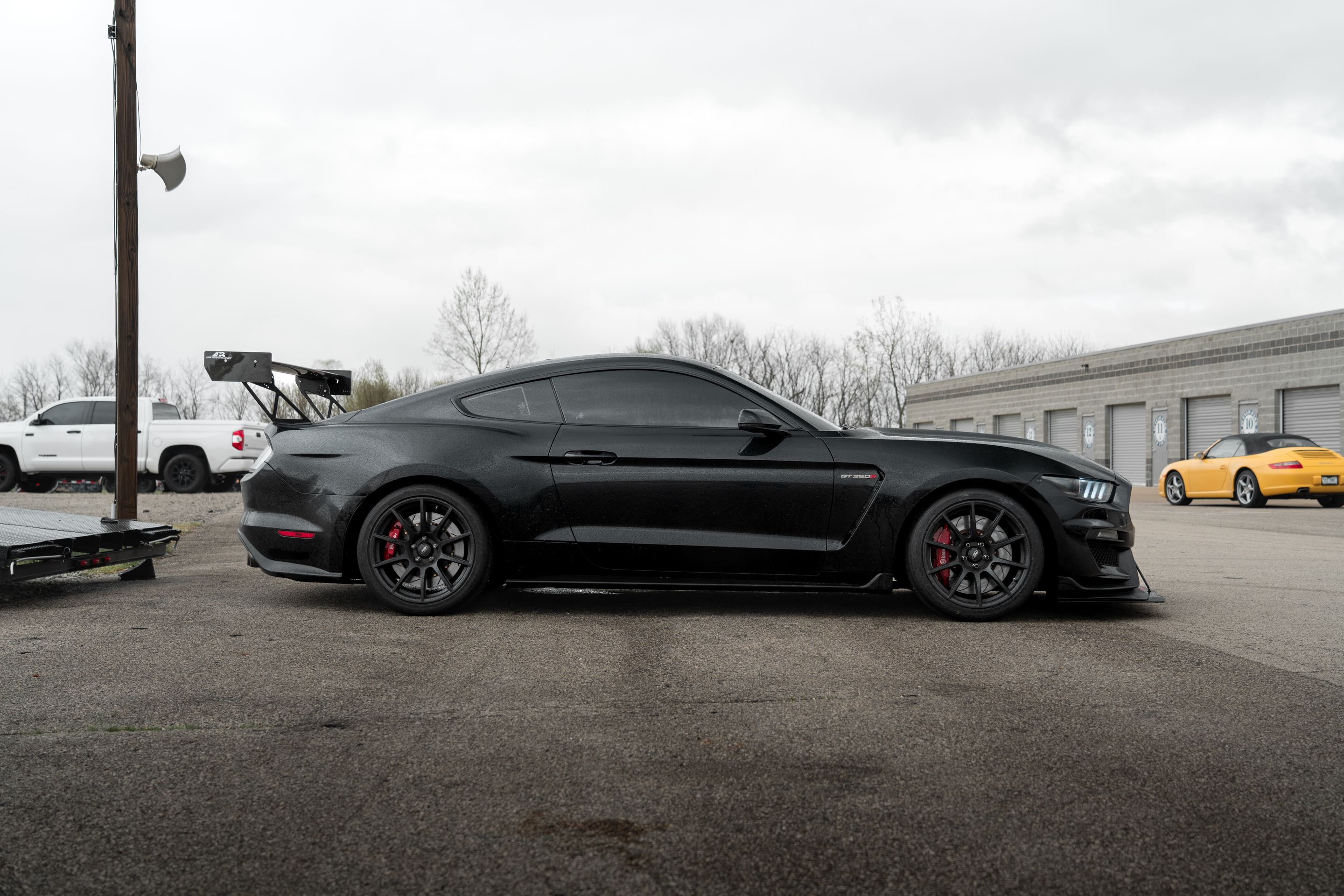 Black Ford S550 Mustang GT350R with 19" SM-10 Apex wheels in Satin Black