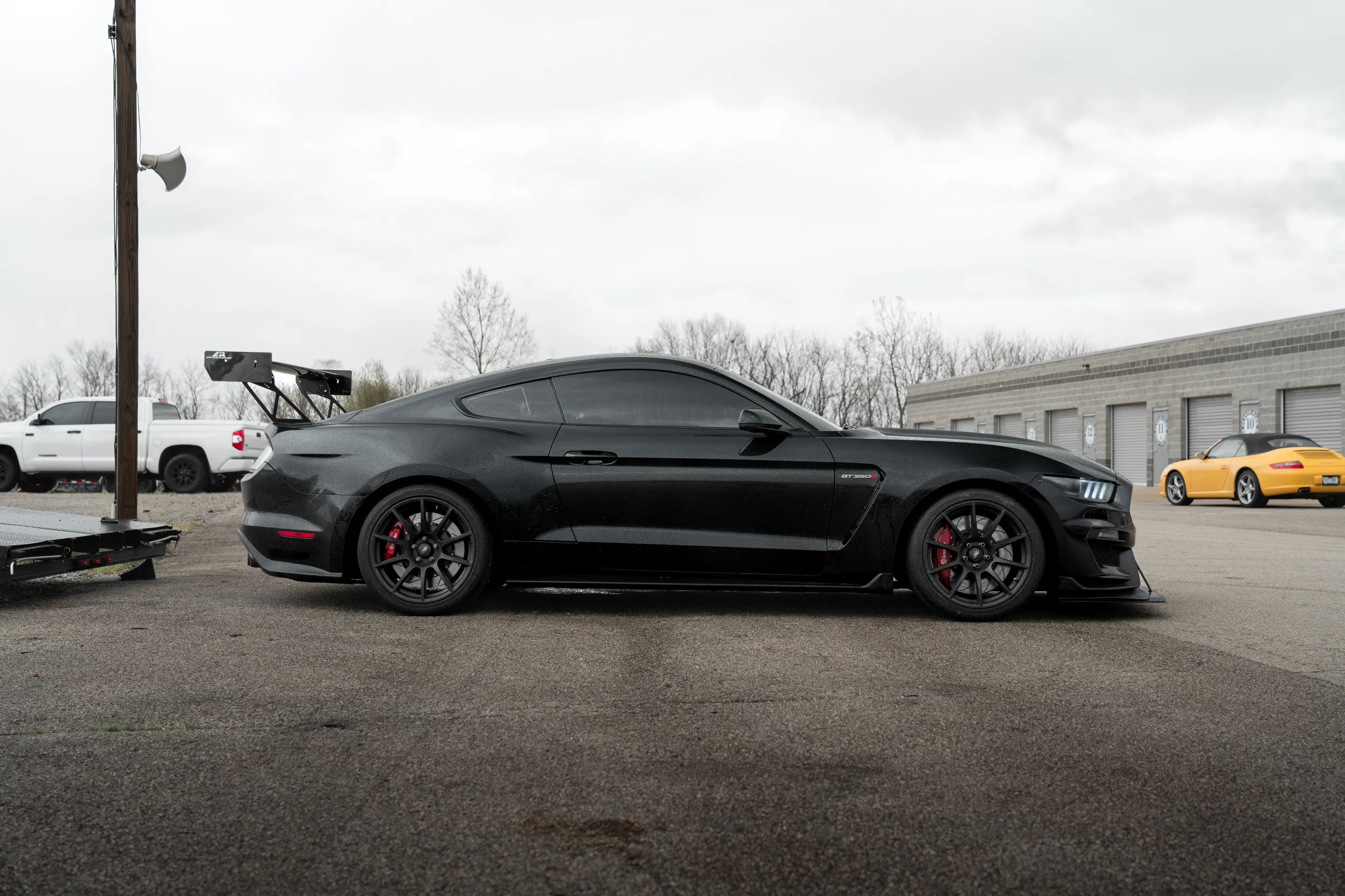 Black Ford S550 Mustang GT350R with 19" SM-10 Apex wheels in Satin Black