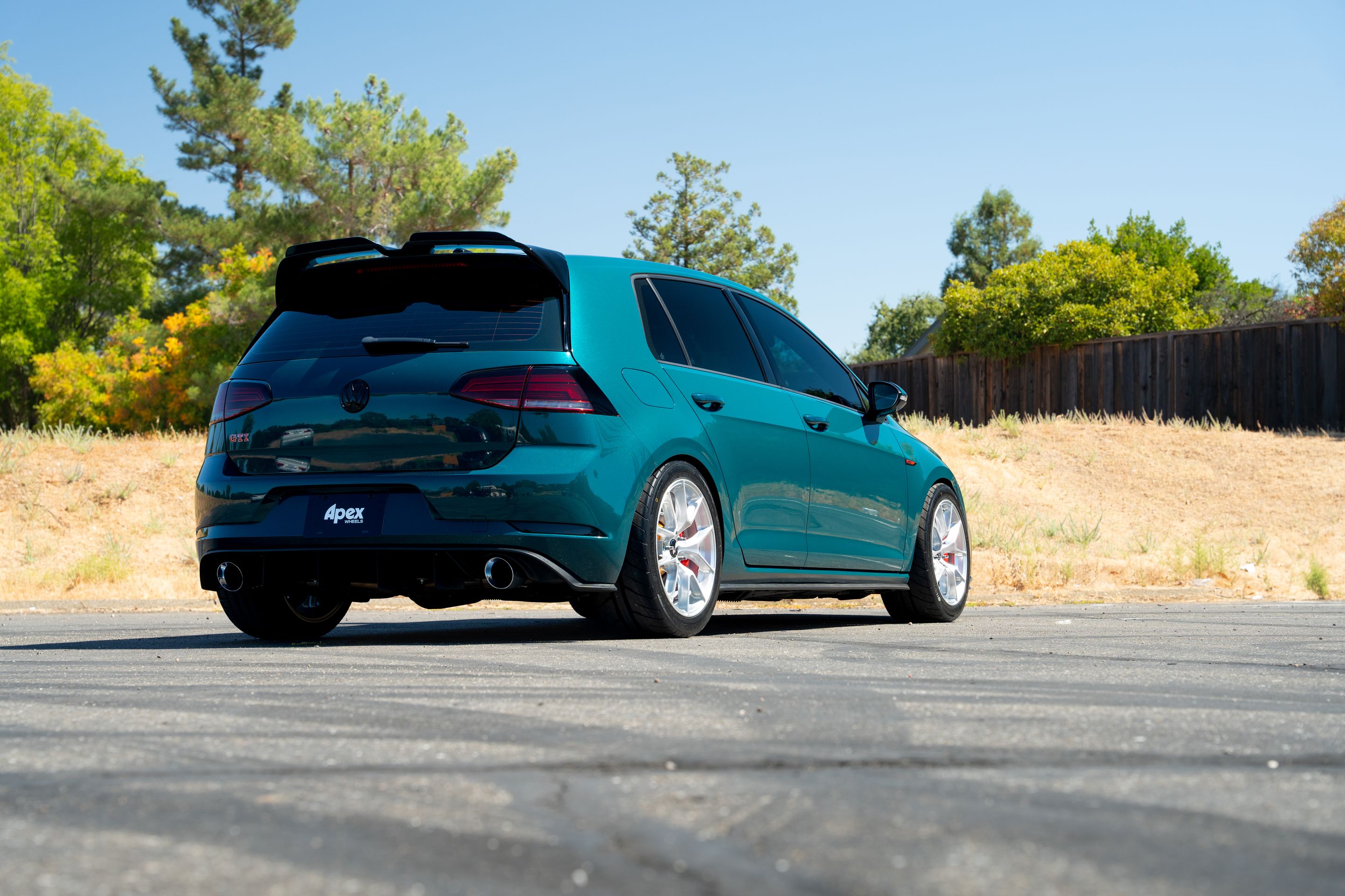 Green VW MK7 GTI with 17" VS-5RS Apex wheels in Brushed Clear
