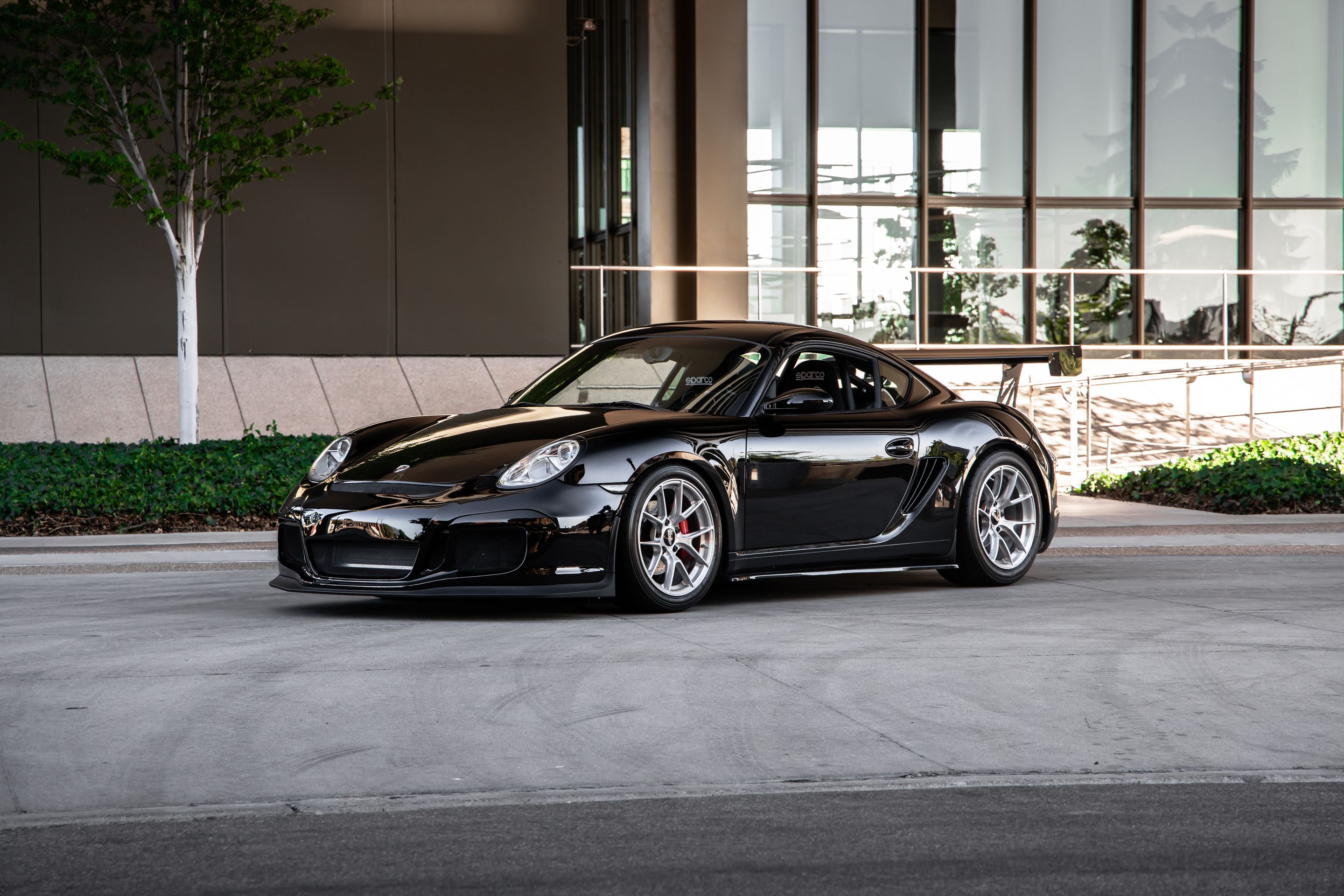 Black Porsche 987 Cayman S with 18" VS-5RS Apex wheels in Brushed Clear