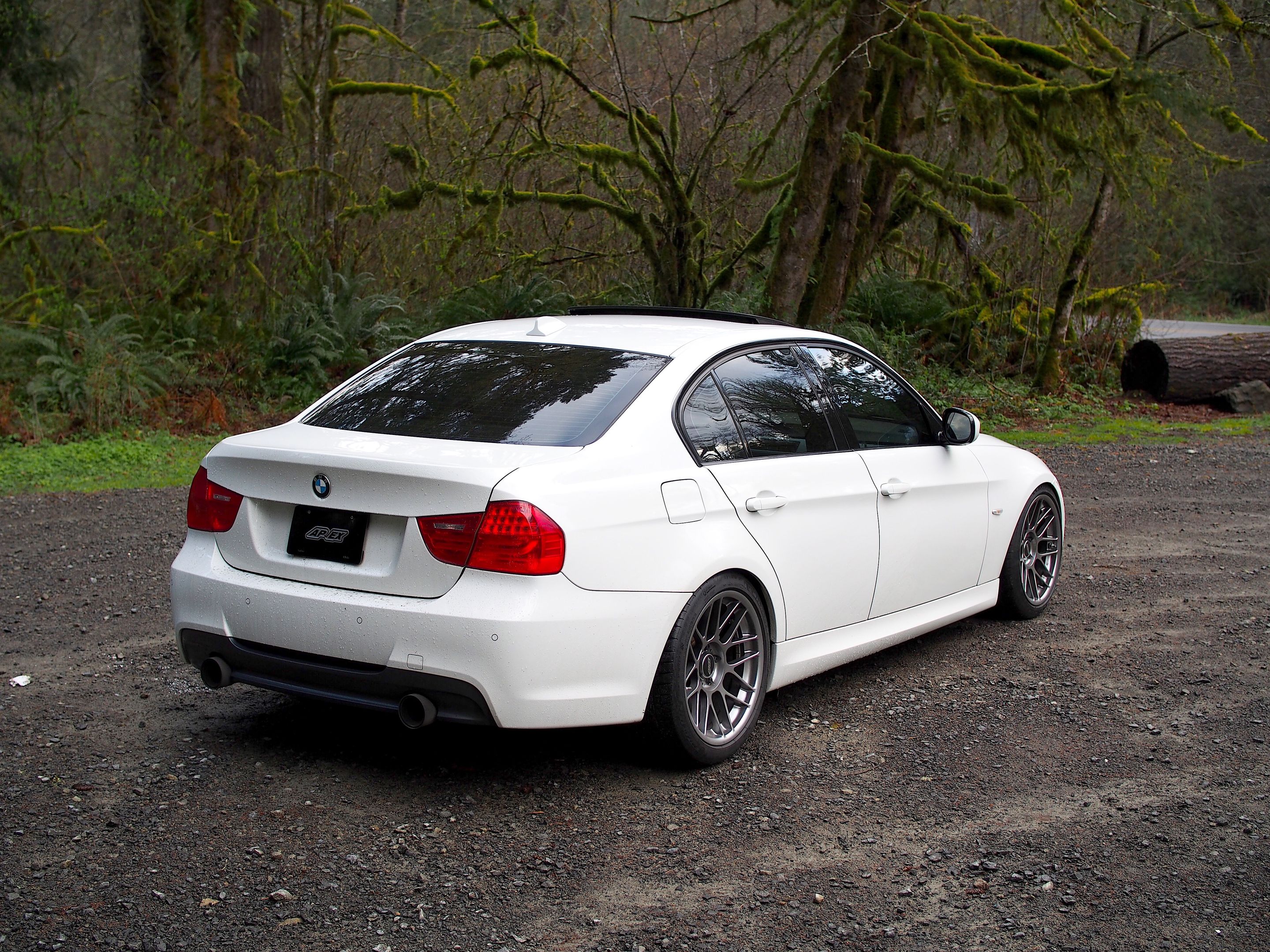 White BMW E90 LCI Sedan 3 Series with 18" ARC-8 Apex wheels in Hyper Black