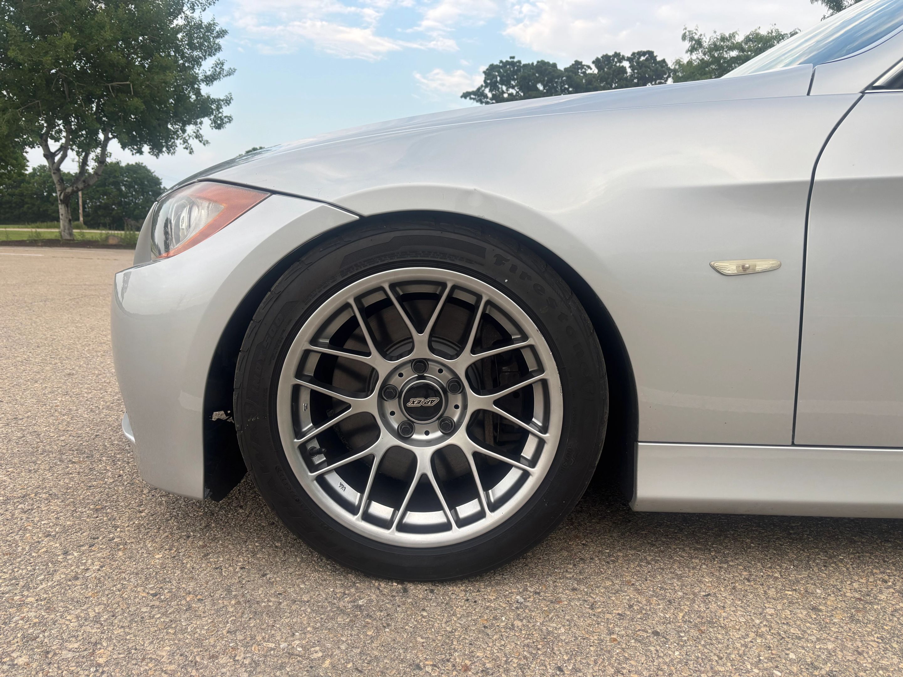Silver BMW  3 Series with 17" ARC-8 Apex wheels in Hyper Black