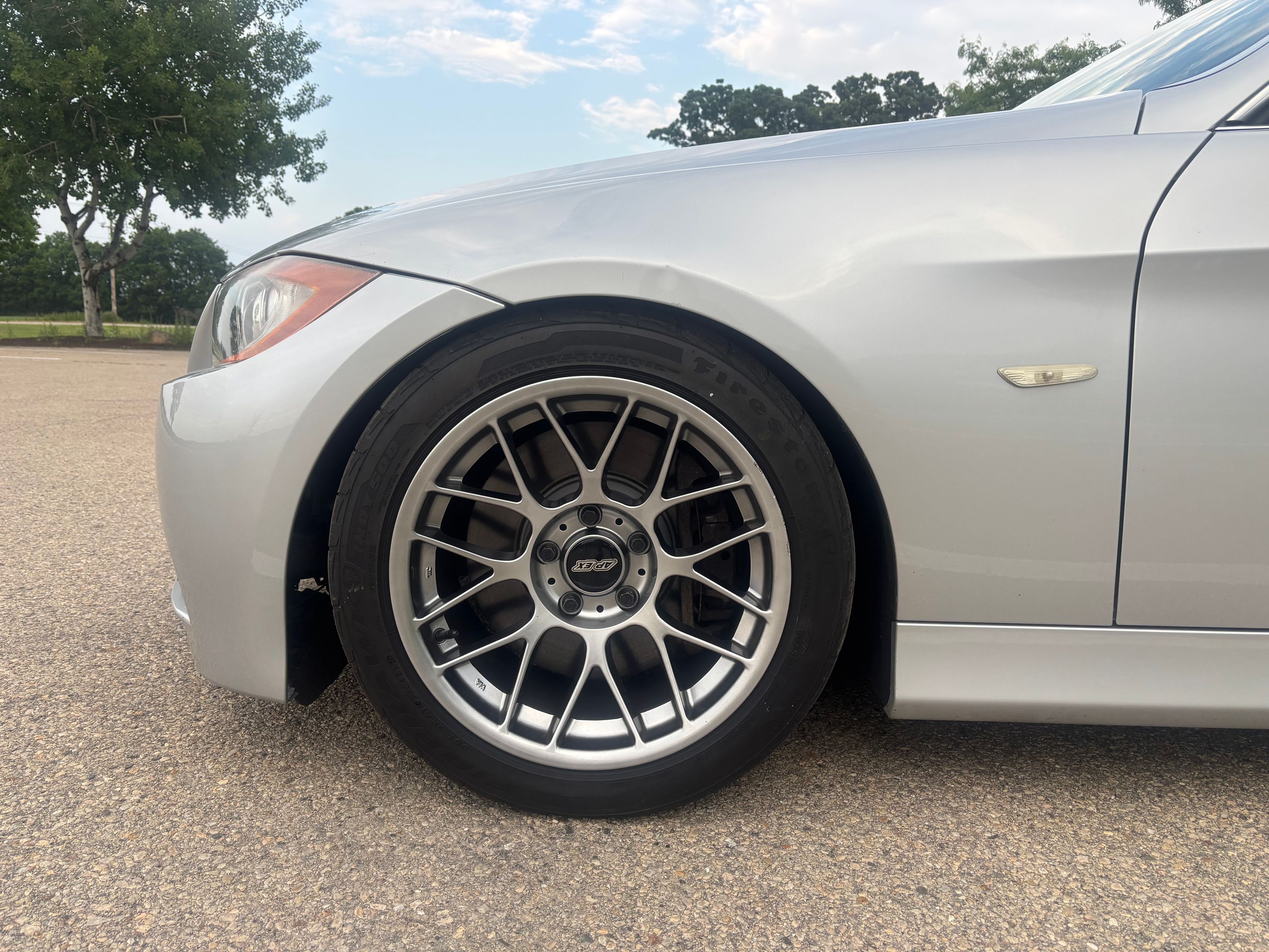 Silver BMW 3 Series with 17" ARC-8 Apex wheels in Hyper Black