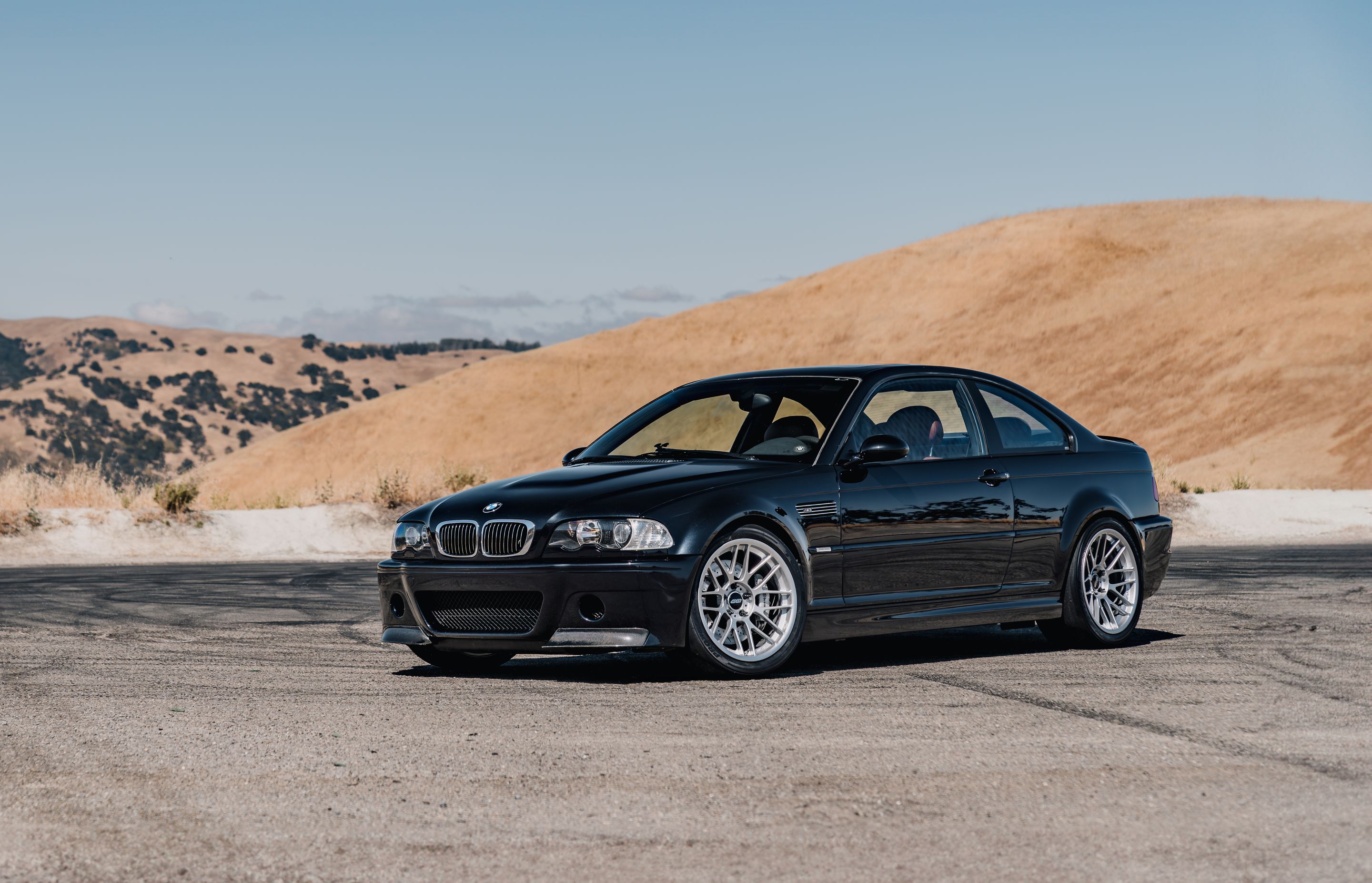 Black BMW E46 M3 with 18" ARC-8RT Apex wheels in Race Silver
