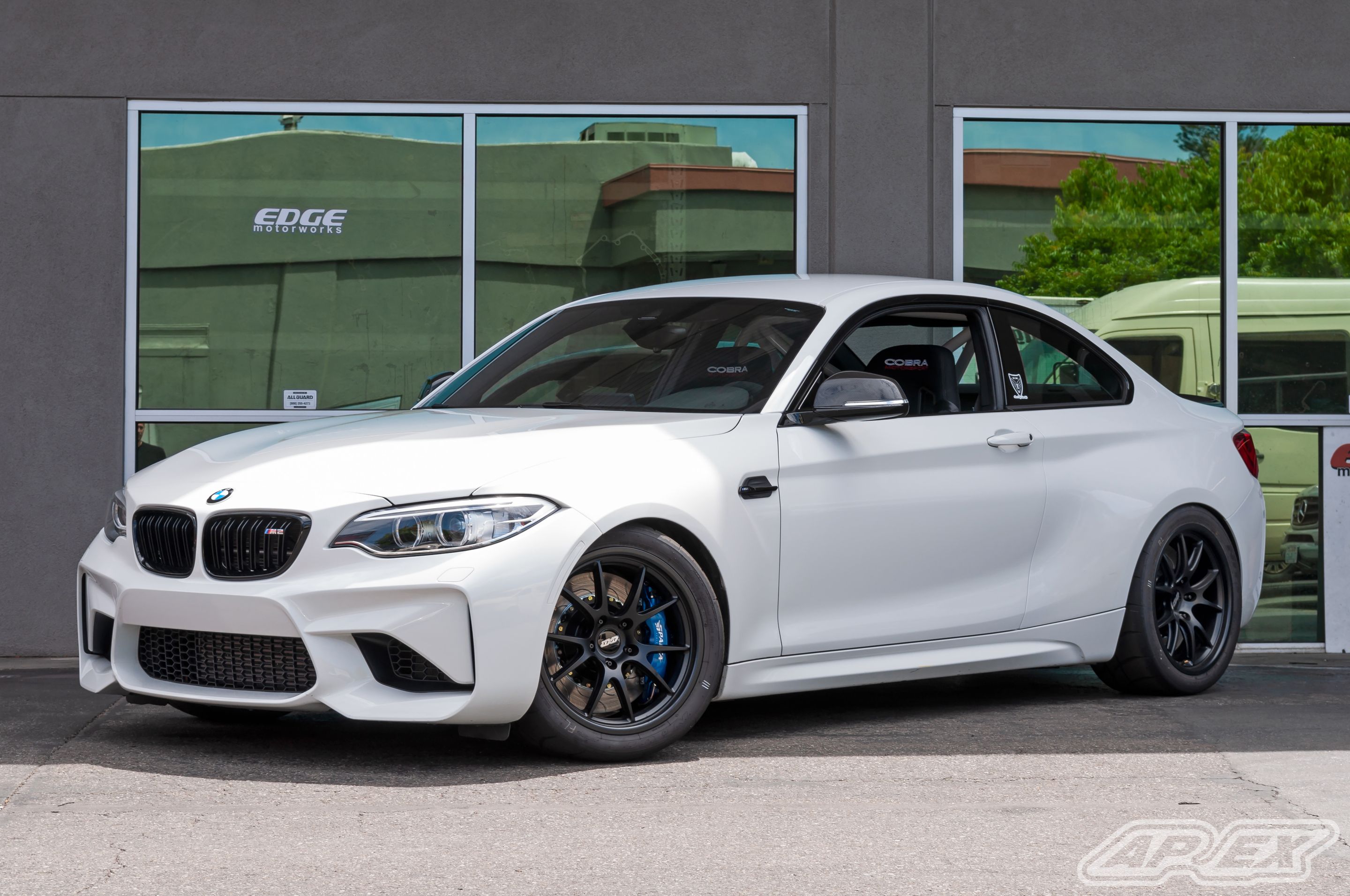 White BMW F87 M2 with 18" FL-5 Apex wheels in Satin Black