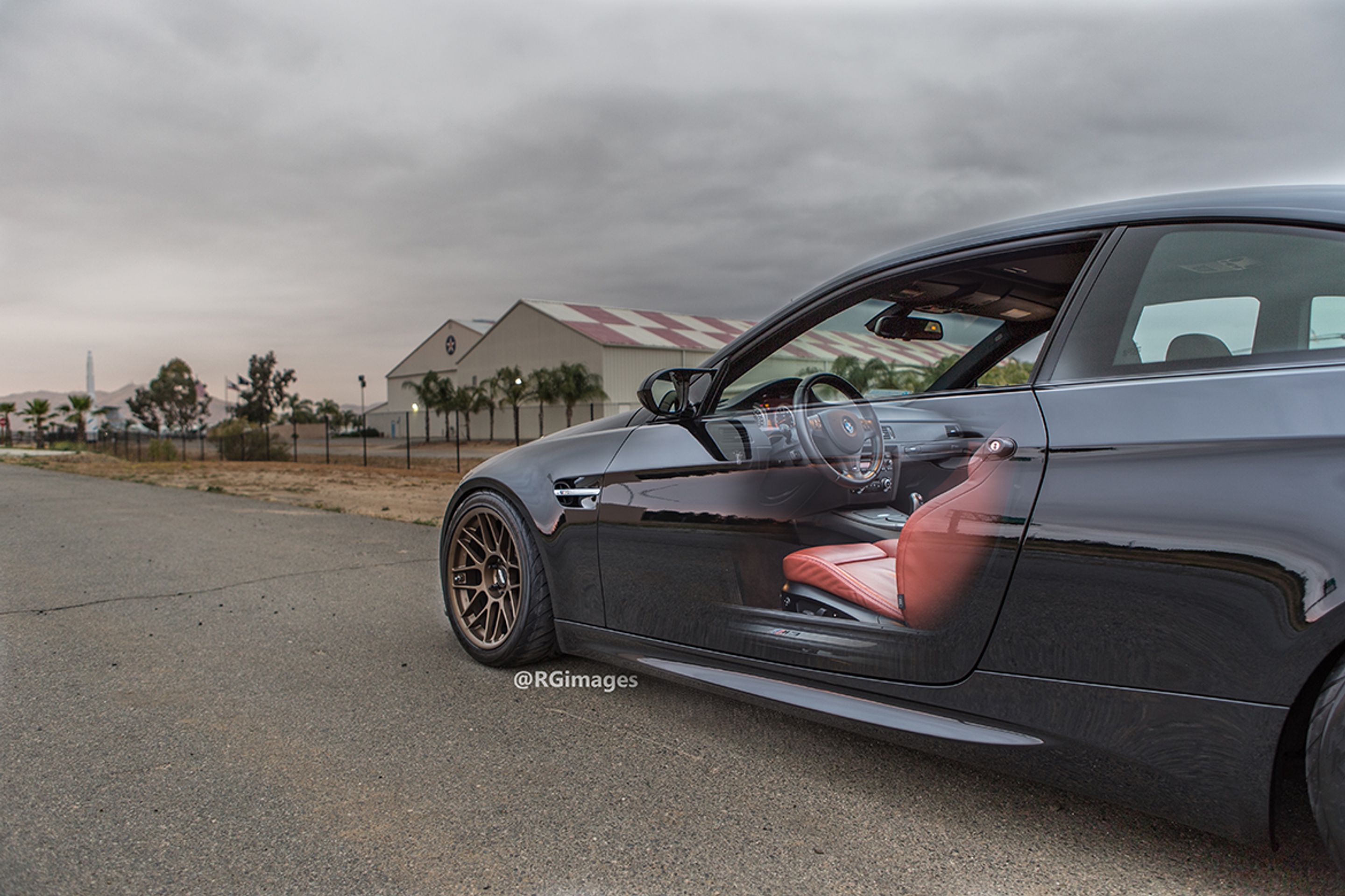 Black BMW E92 Coupe M3 with 18" ARC-8 Apex wheels in Satin Bronze