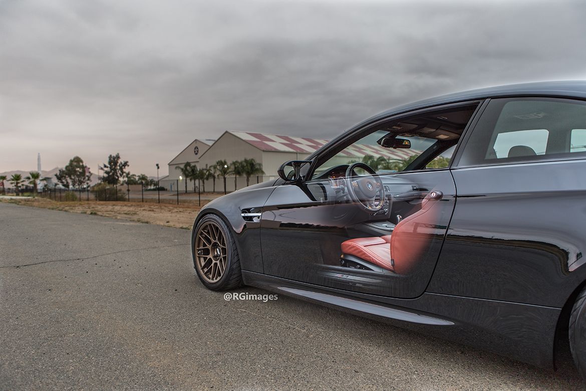 Black BMW E92 Coupe M3 with 18" ARC-8 Apex wheels in Satin Bronze