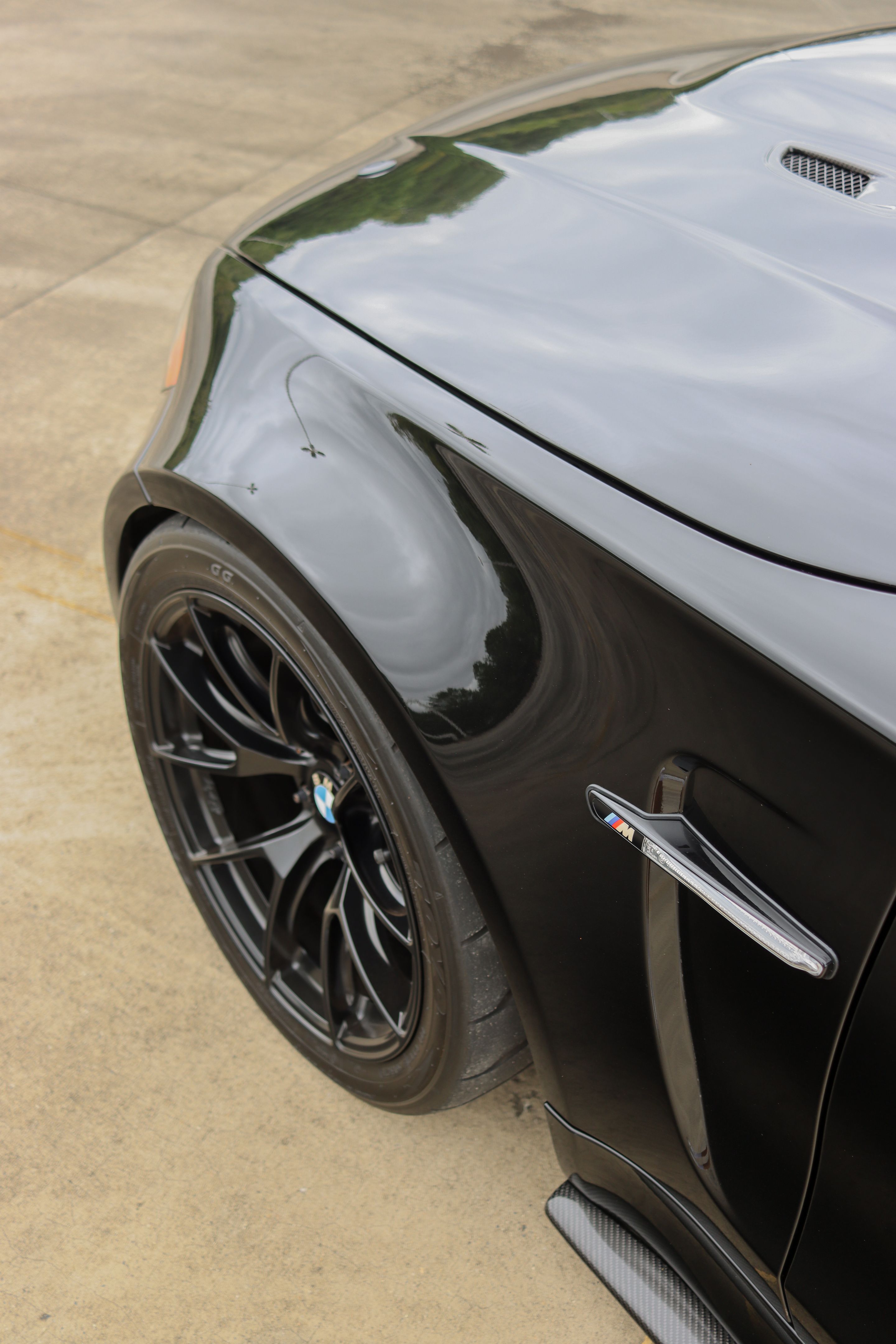 Black BMW E82 1M with 18" VS-5RS Apex wheels in Satin Black